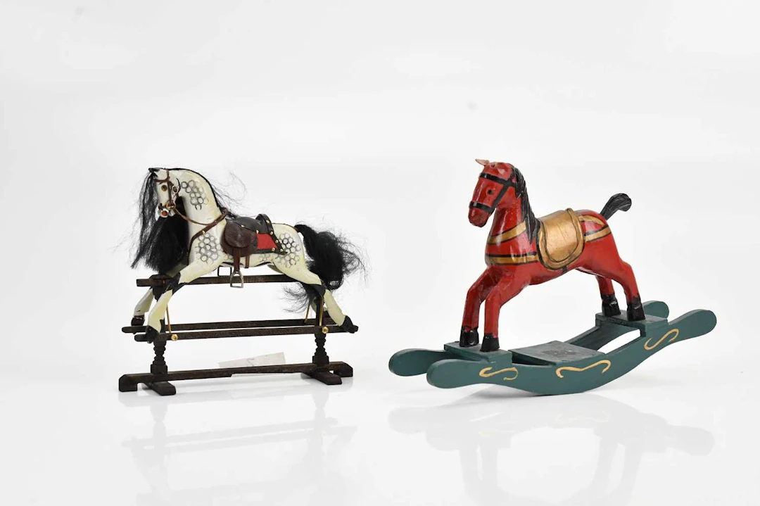 Two hand carved rocking horses for doll's house
