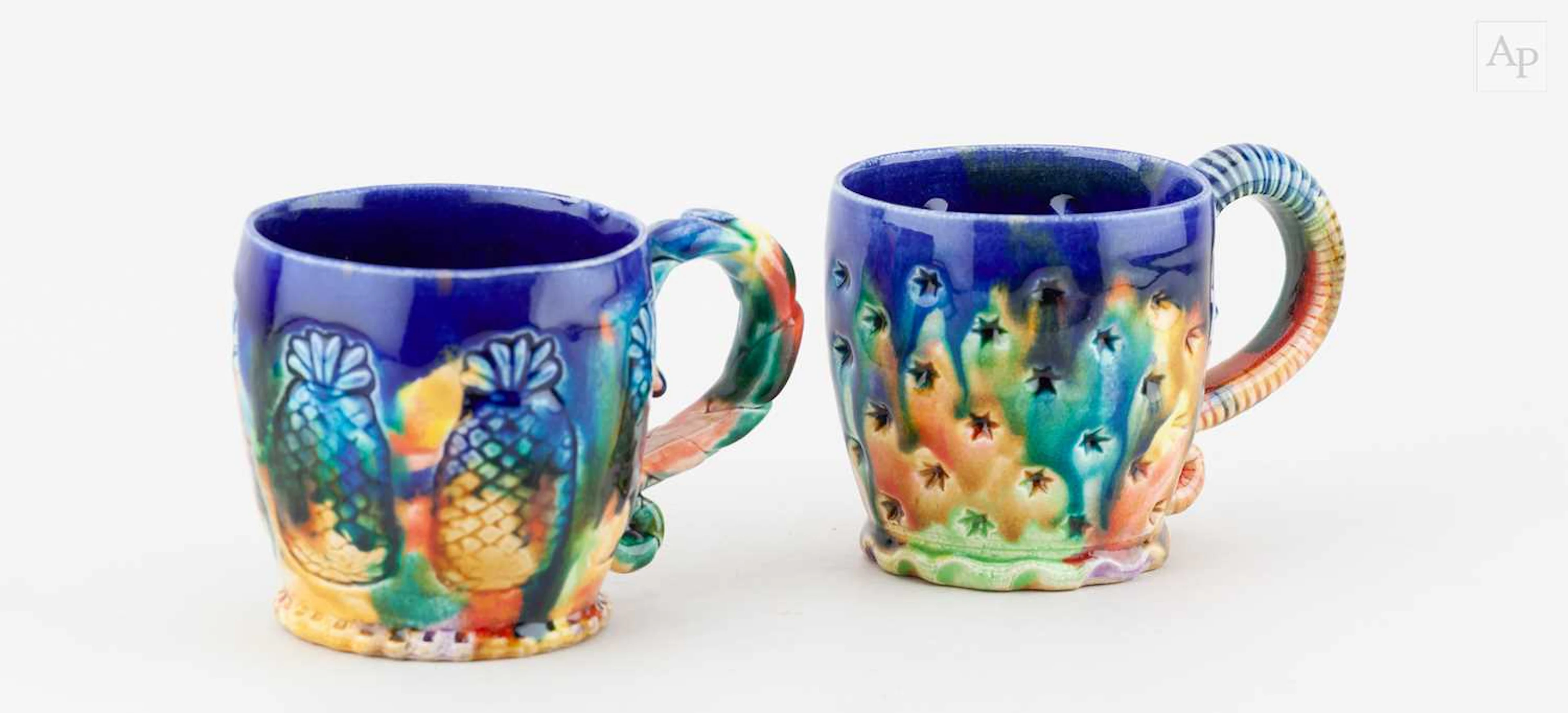 KATE MALONE (born 1959); a near pair of earthenware mugs...