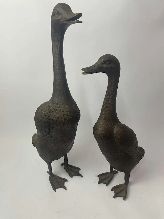 A pair of bronzed brass runner ducks