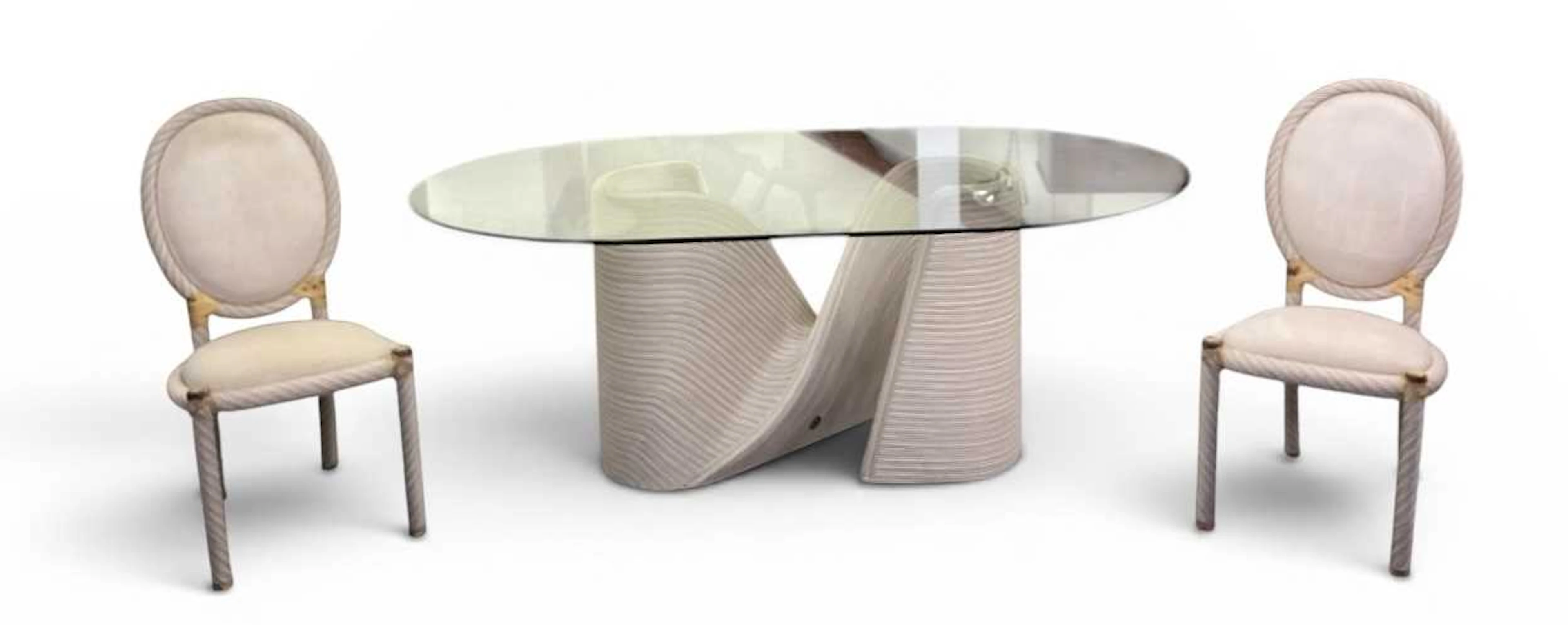 BETTY COBONPUE; a modern contemporary oval glass topped...