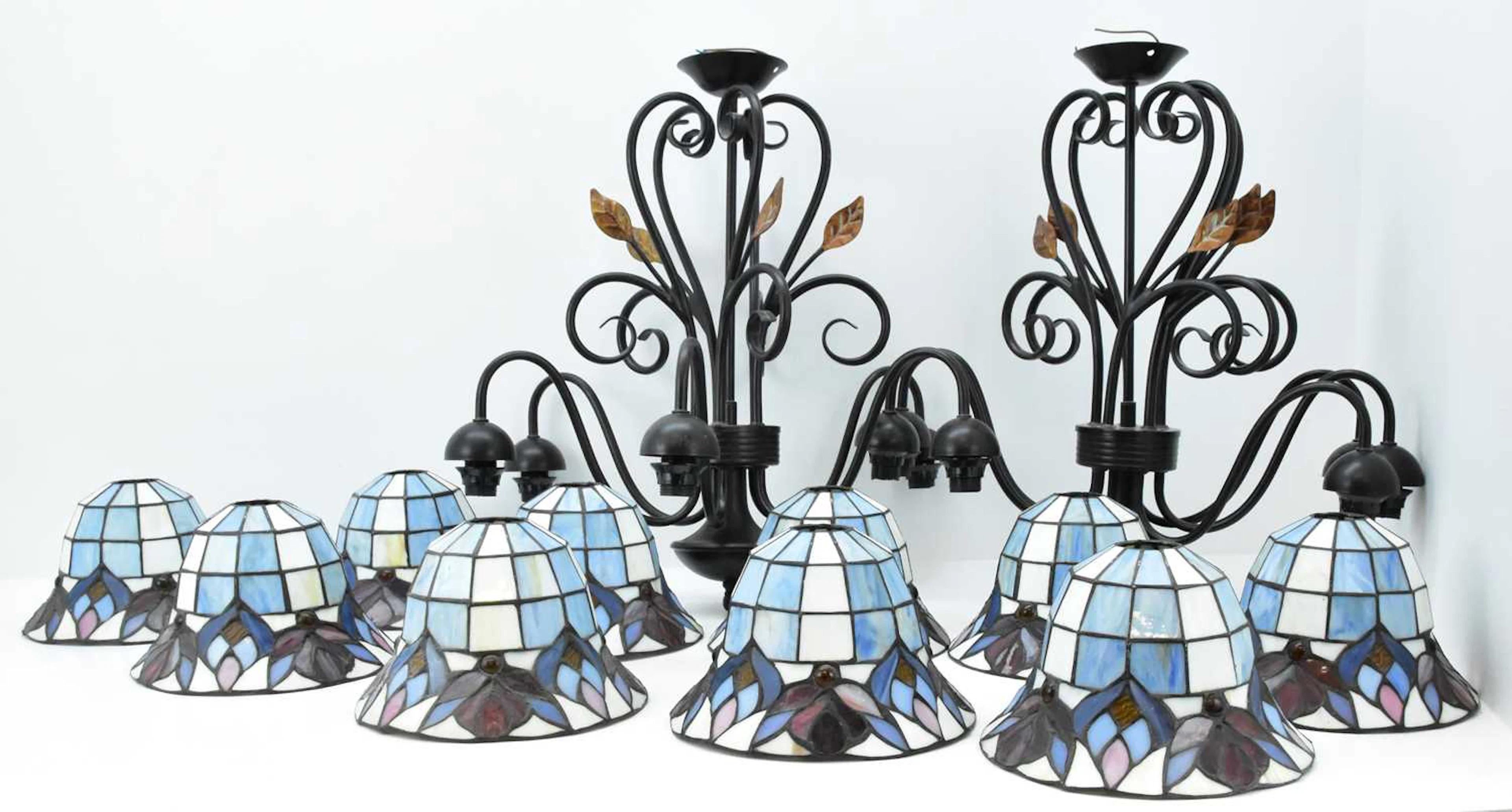 A pair of modern Loxton five-light chandeliers in the Tiffany style