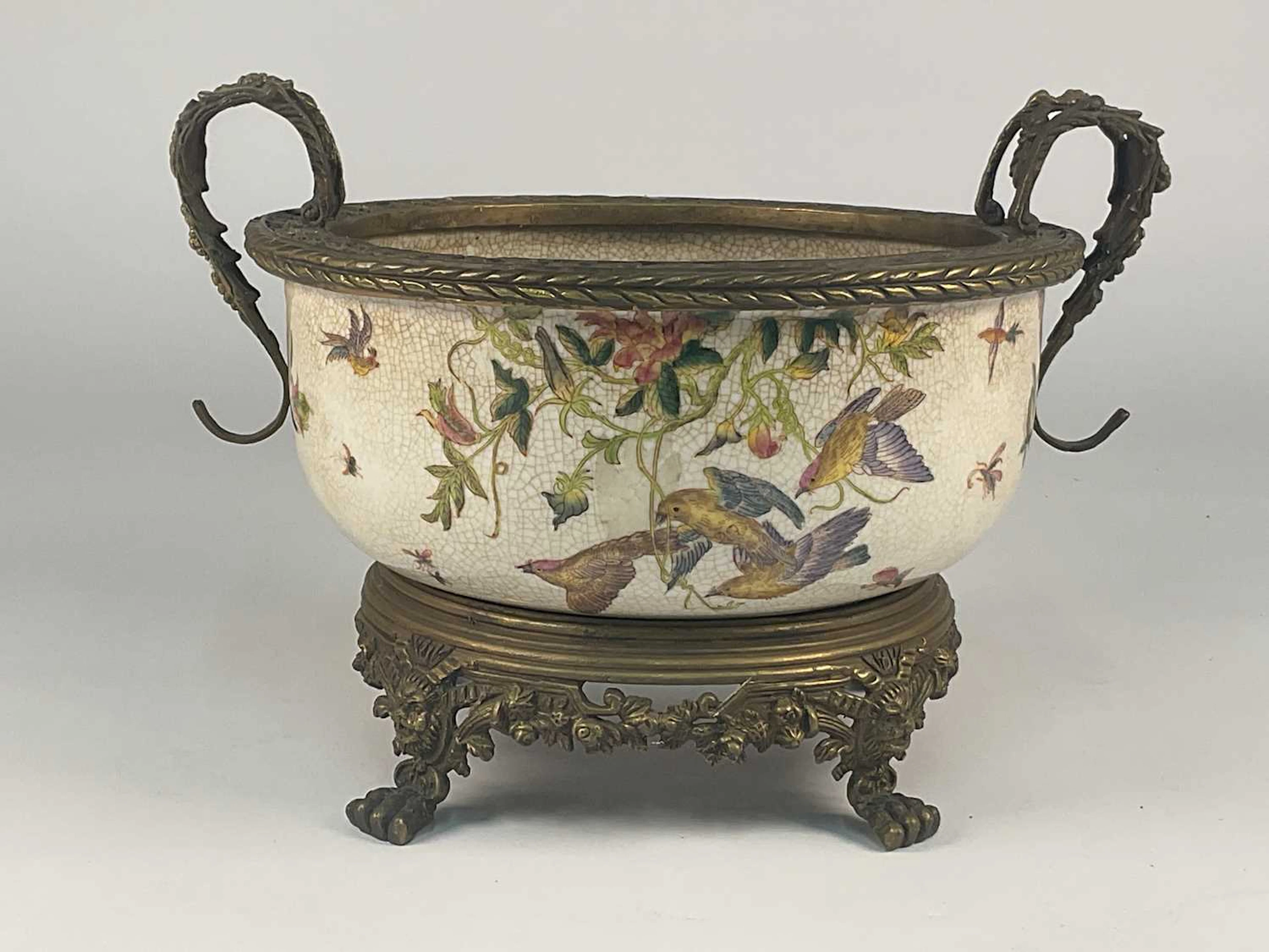 A Chinese crackle glazed bowl decorated with birds and...