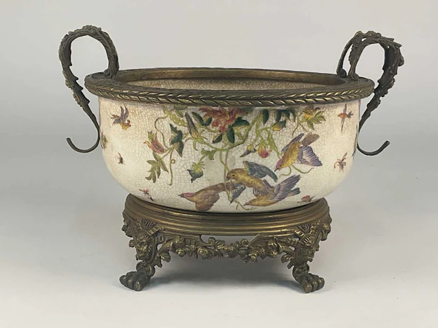 A Chinese crackle glazed bowl decorated with birds and...