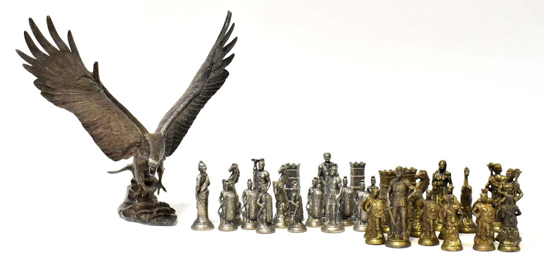 A pewter model of an eagle on a texured base
