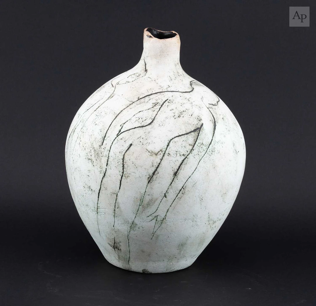 NANCY BALDWIN (1934-2021); an earthenware bottle...
