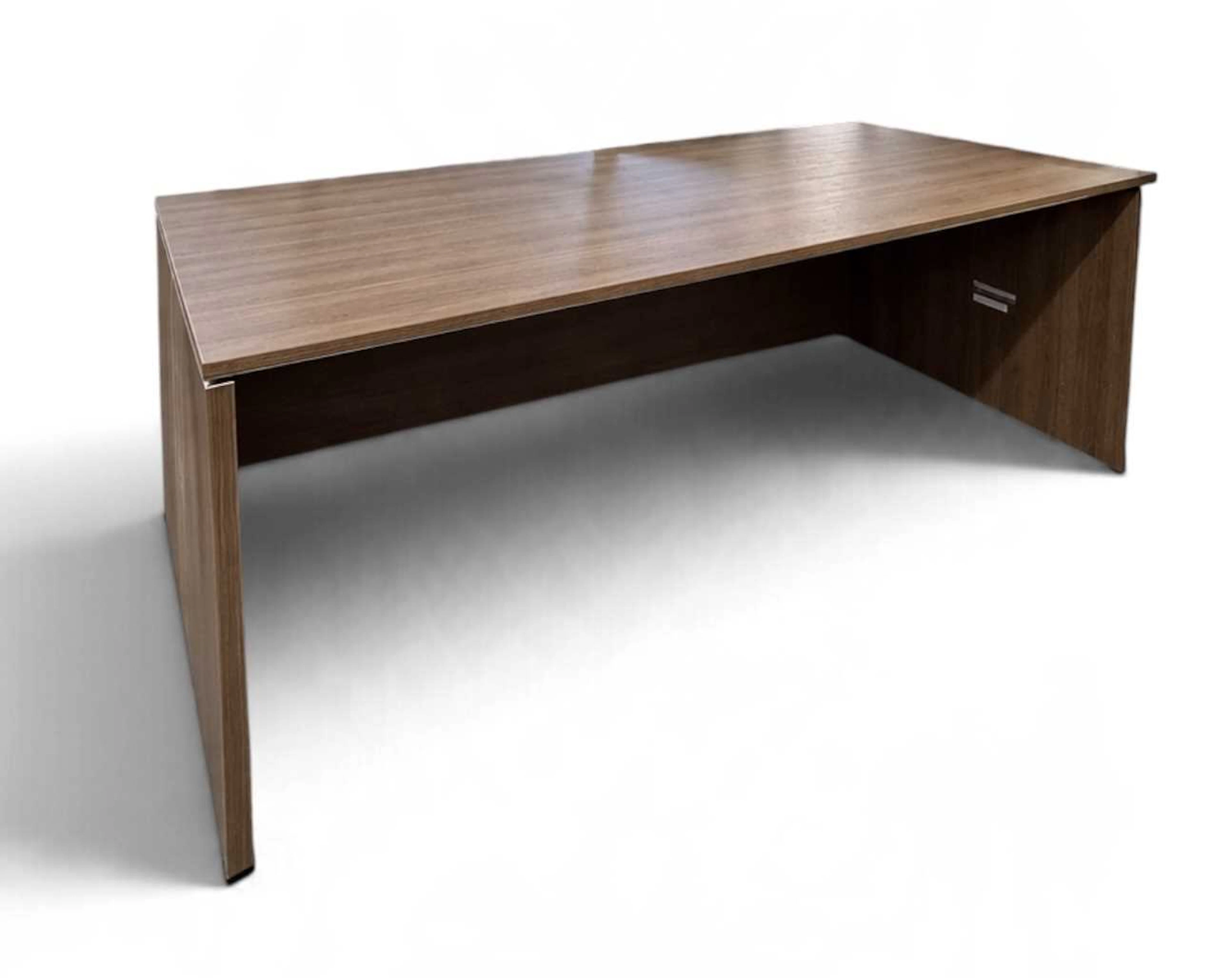 A large modern contemporary Italian veneered rectangular topped desk