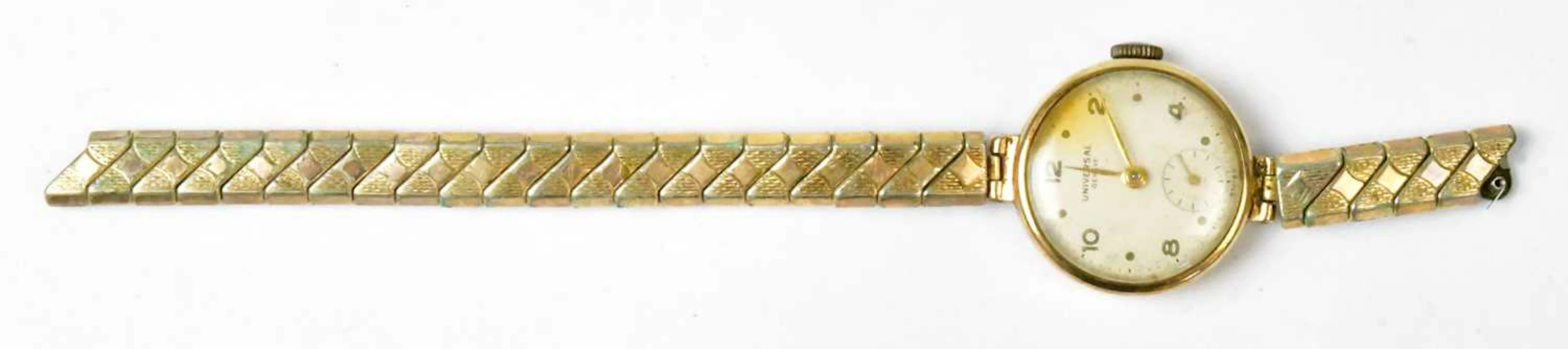 UNIVERSAL; a 9ct yellow gold cocktail watch head
