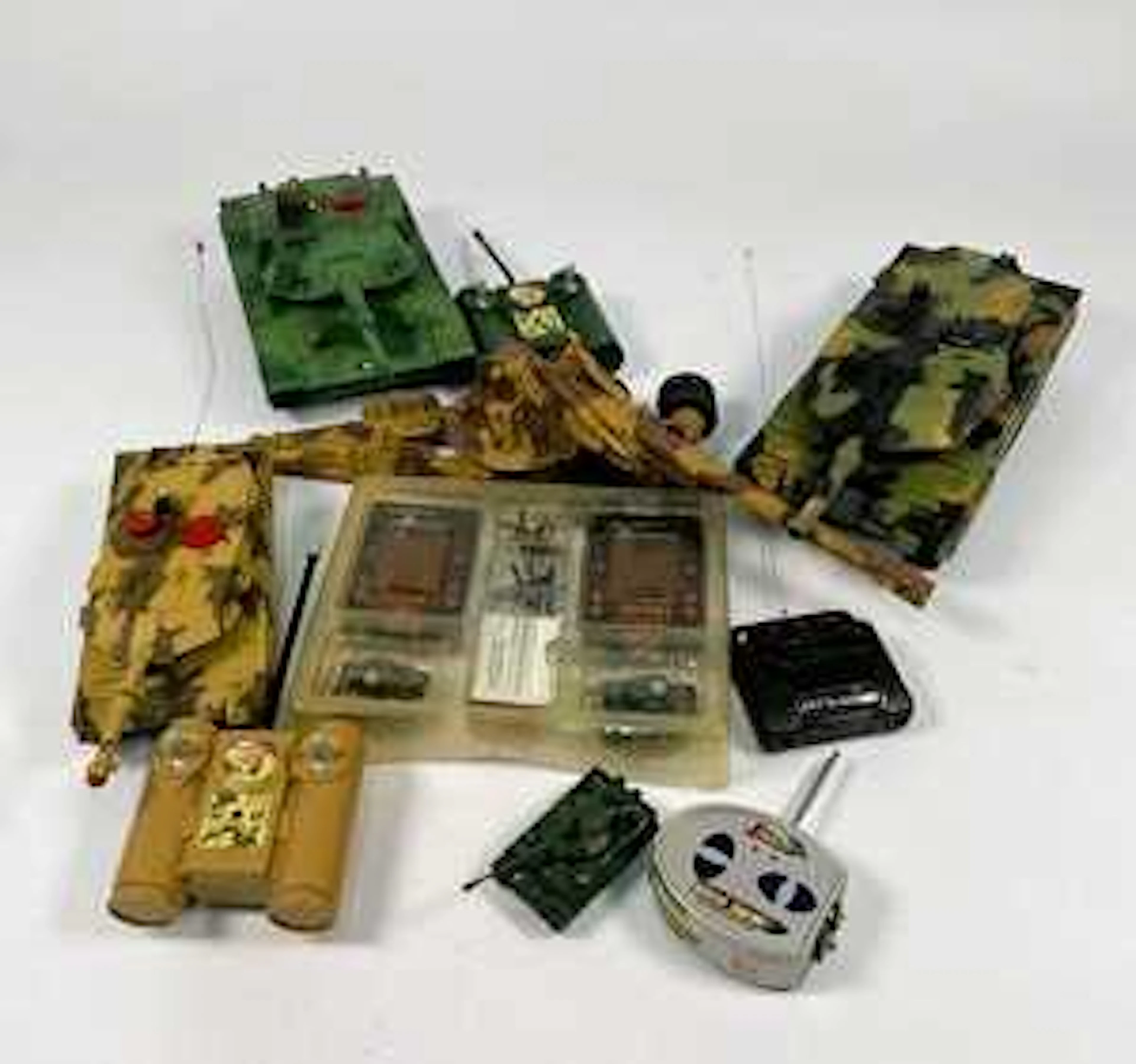 A quantity of battery operated remote controlled tanks