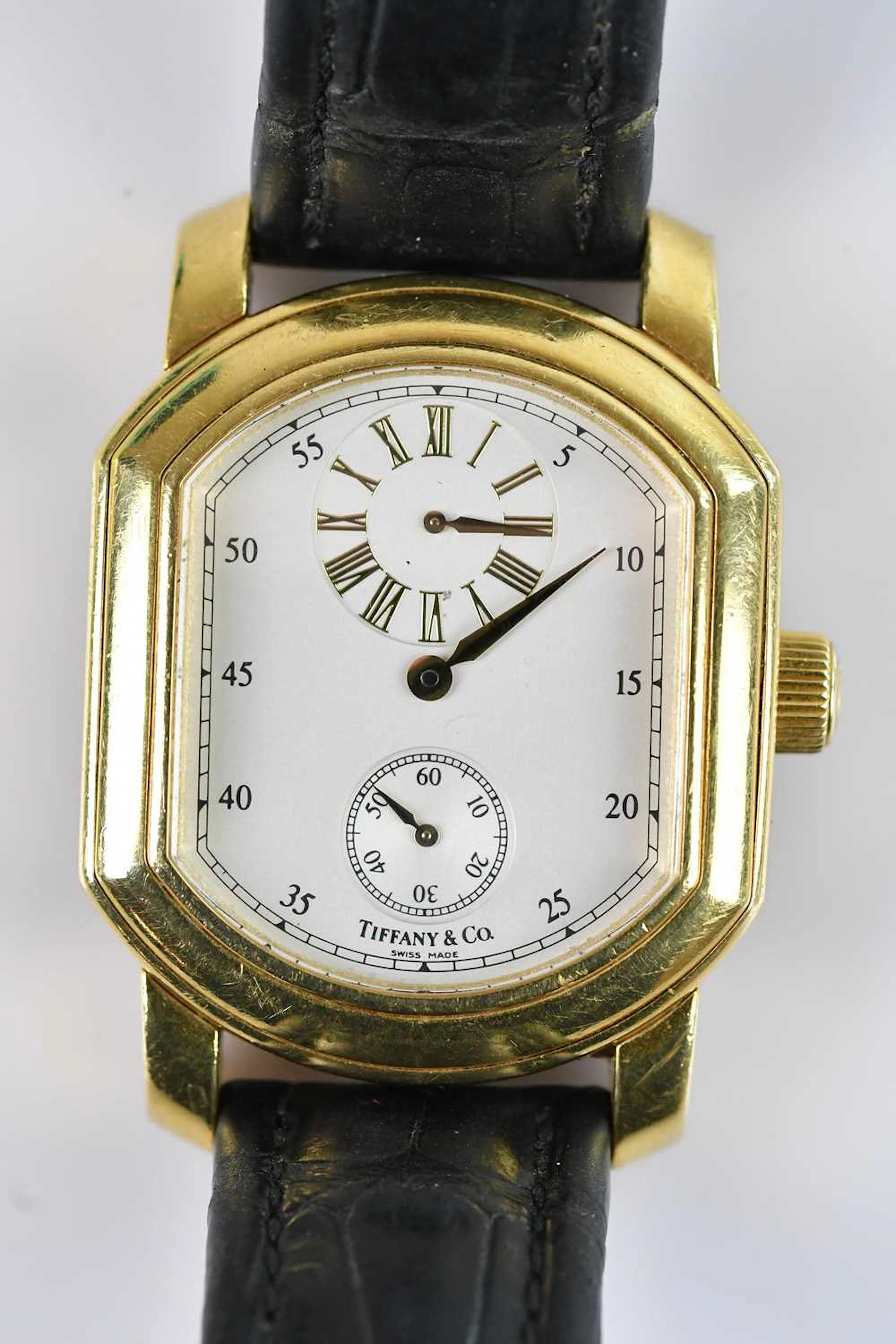 TIFFANY & CO; a rare gentleman's 18ct yellow gold Mark Coupe wristwatch