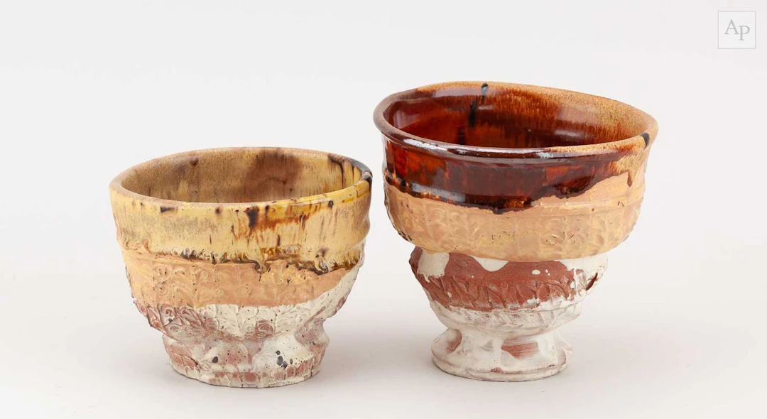 SIMON CARROLL (1964-2009); an earthenware teabowl covered...