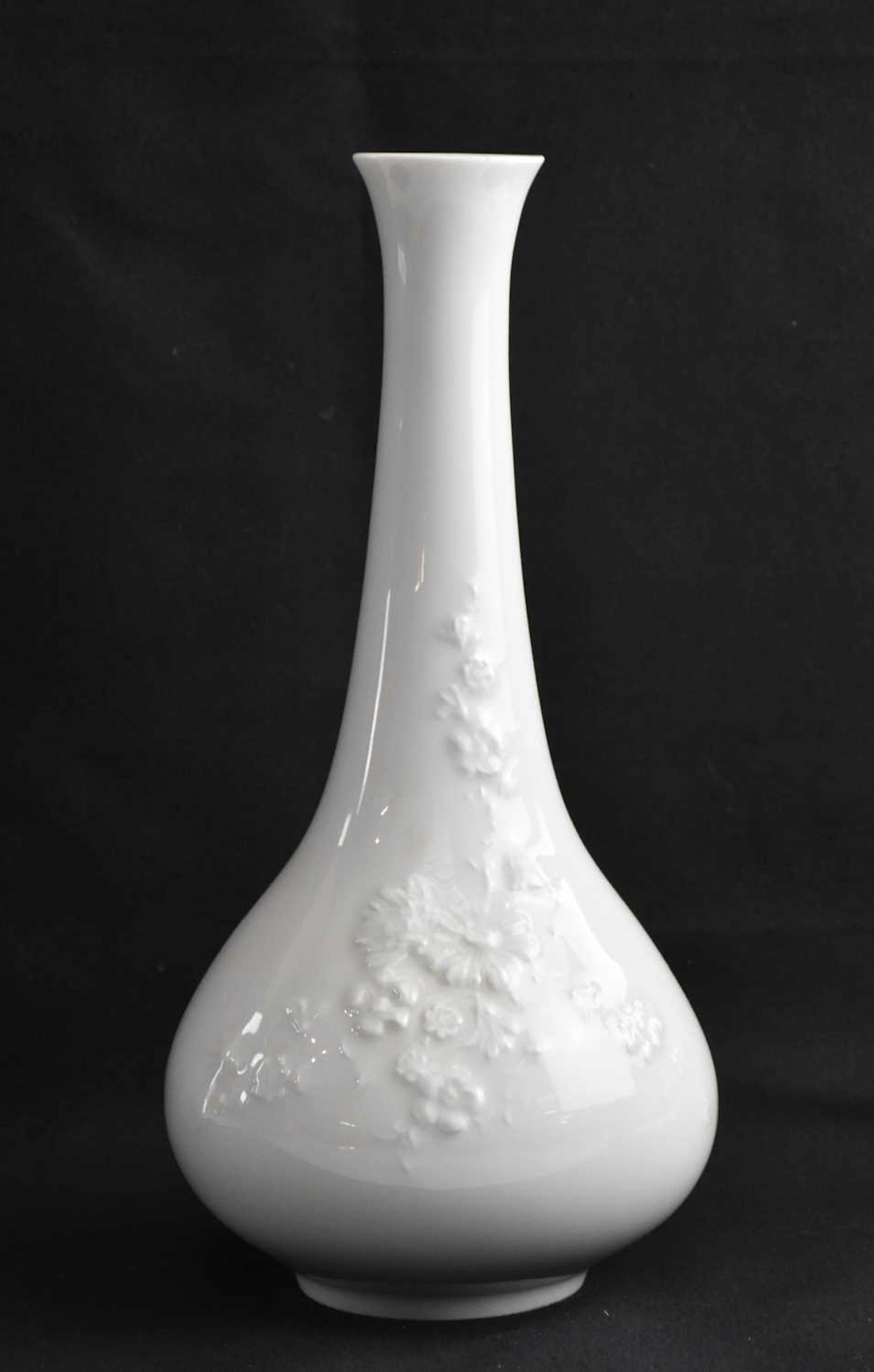 MEISSEN; a porcelain vase with floral relief pattern