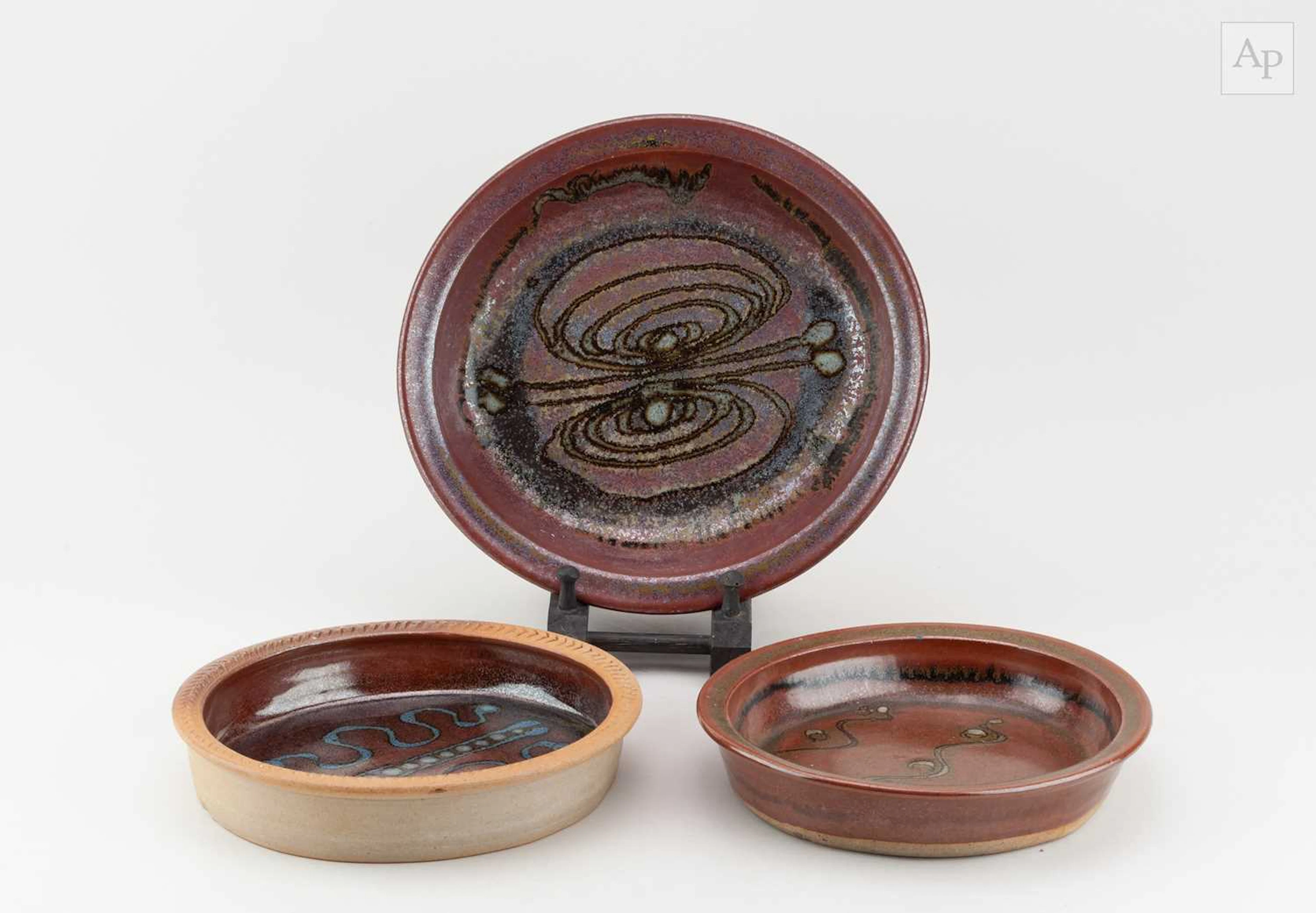 Winchcombe Pottery; a trio of oval stoneware dishes...