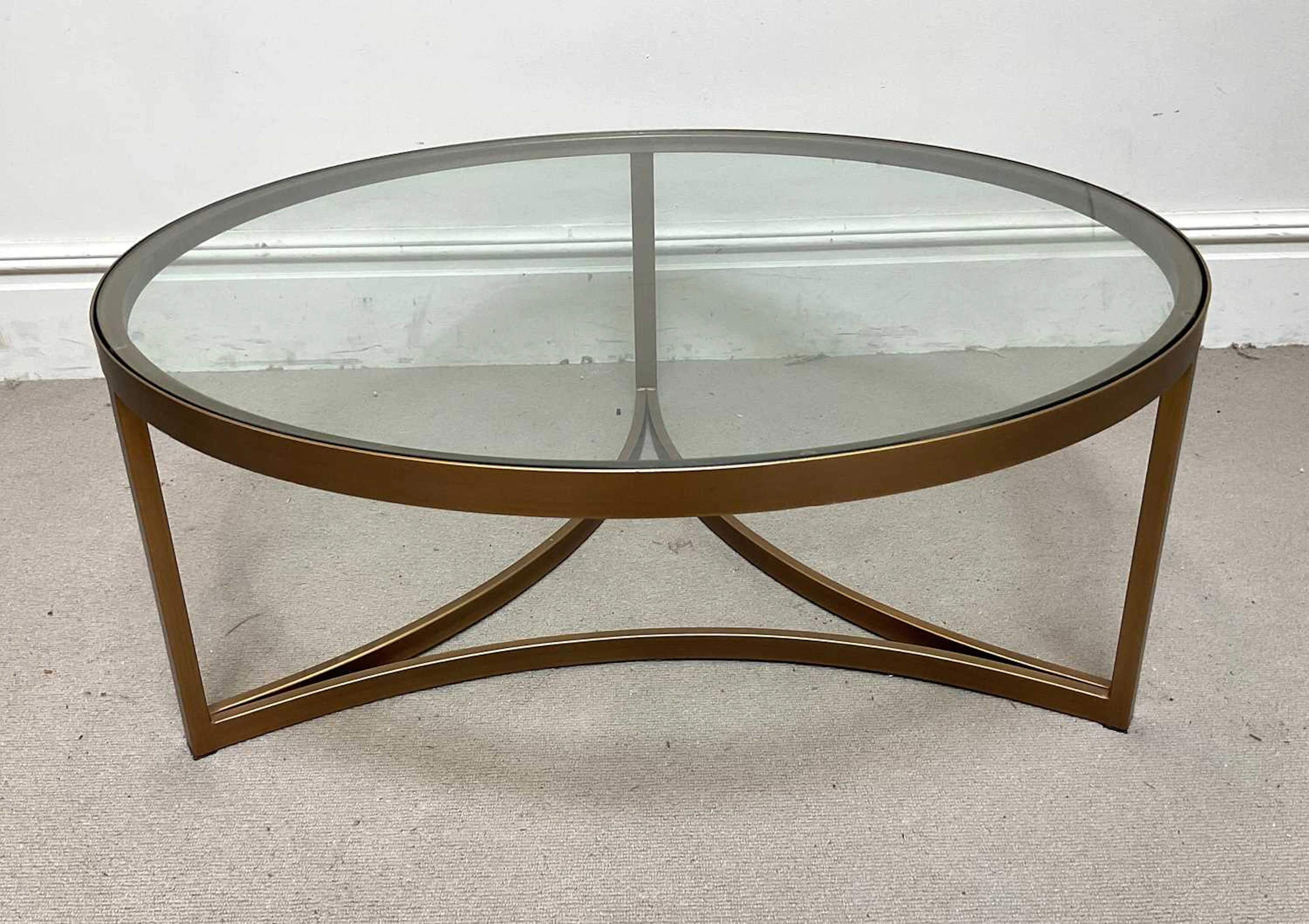 ANDREW MARTIN; a Sundance coffee table with glass top