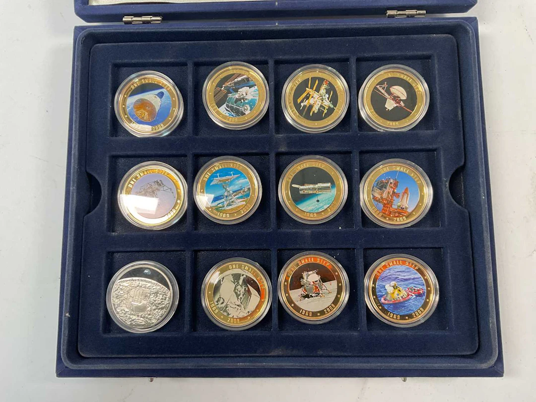 WESTMINSTER; eleven encapsulated collectible Cook Islands one dollar coins