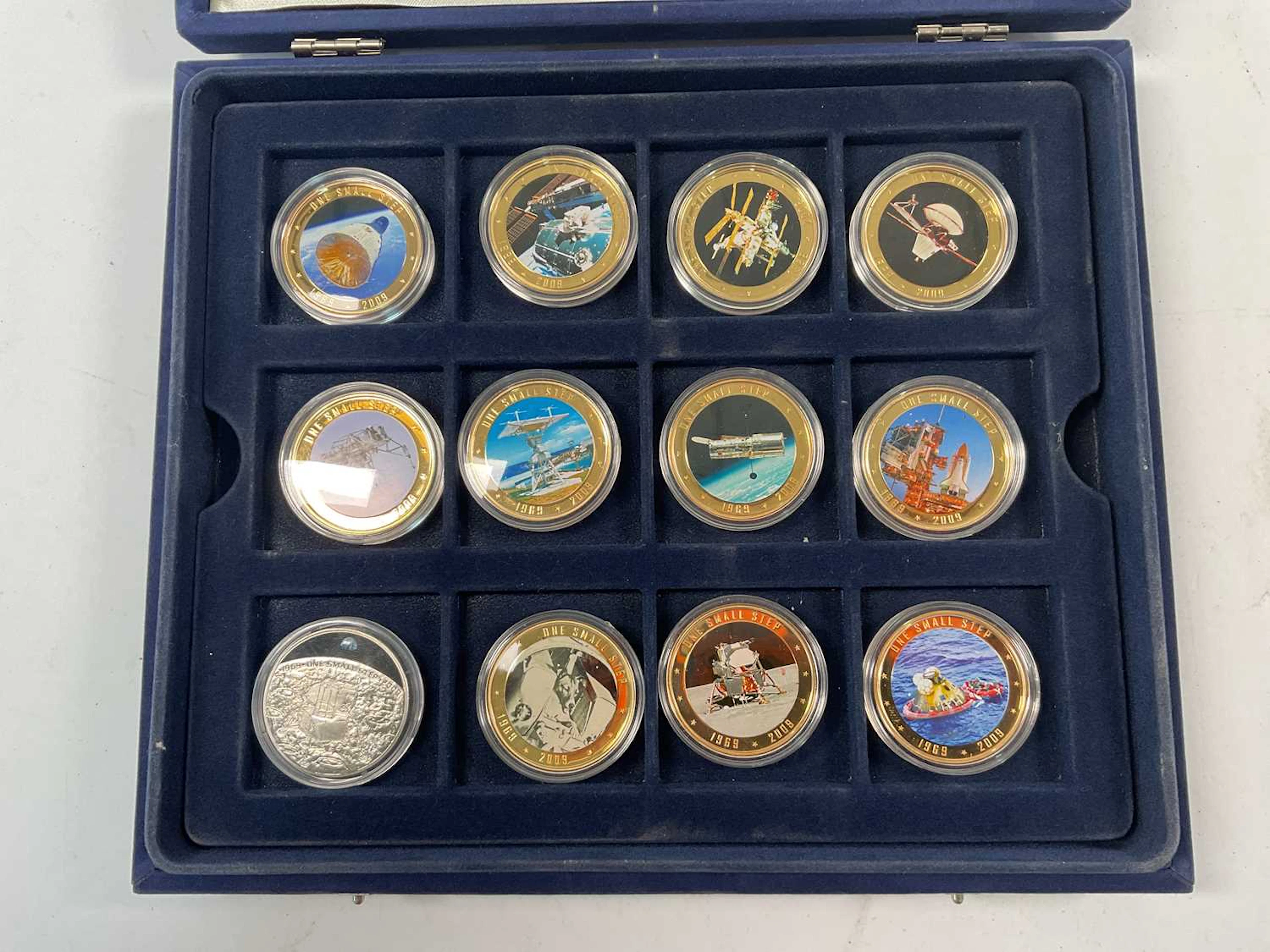 WESTMINSTER; eleven encapsulated collectible Cook Islands one dollar coins