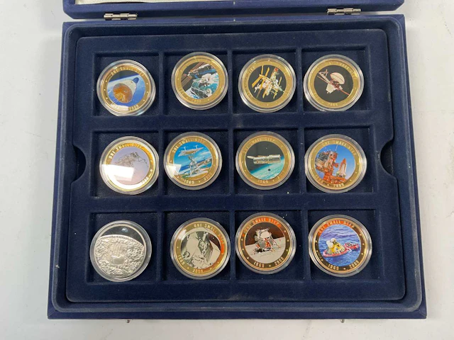 WESTMINSTER; eleven encapsulated collectible Cook Islands one dollar coins