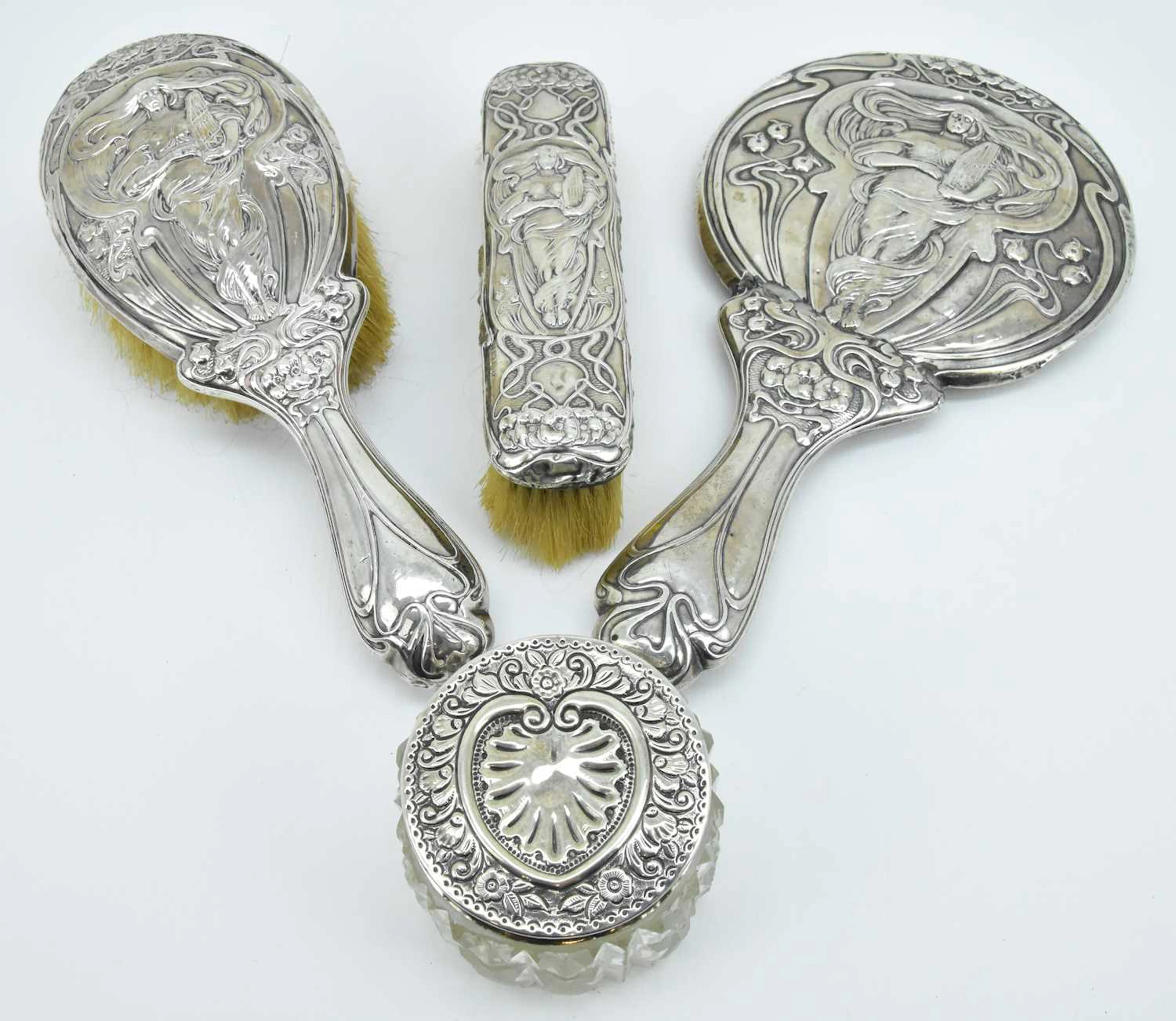 CHARLES HORNER; an Edwardian Art Nouveau patterned three...