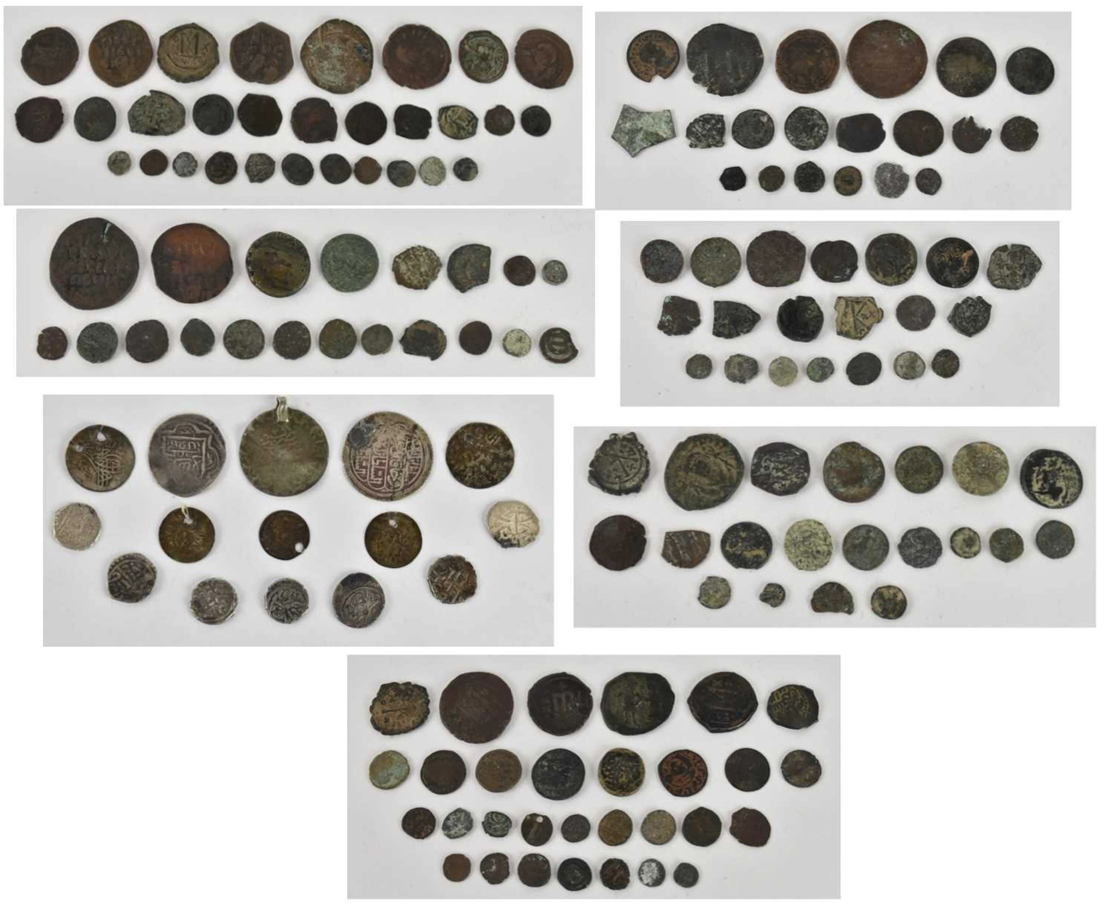 A large collection of Ancient Greek and Roman style coins