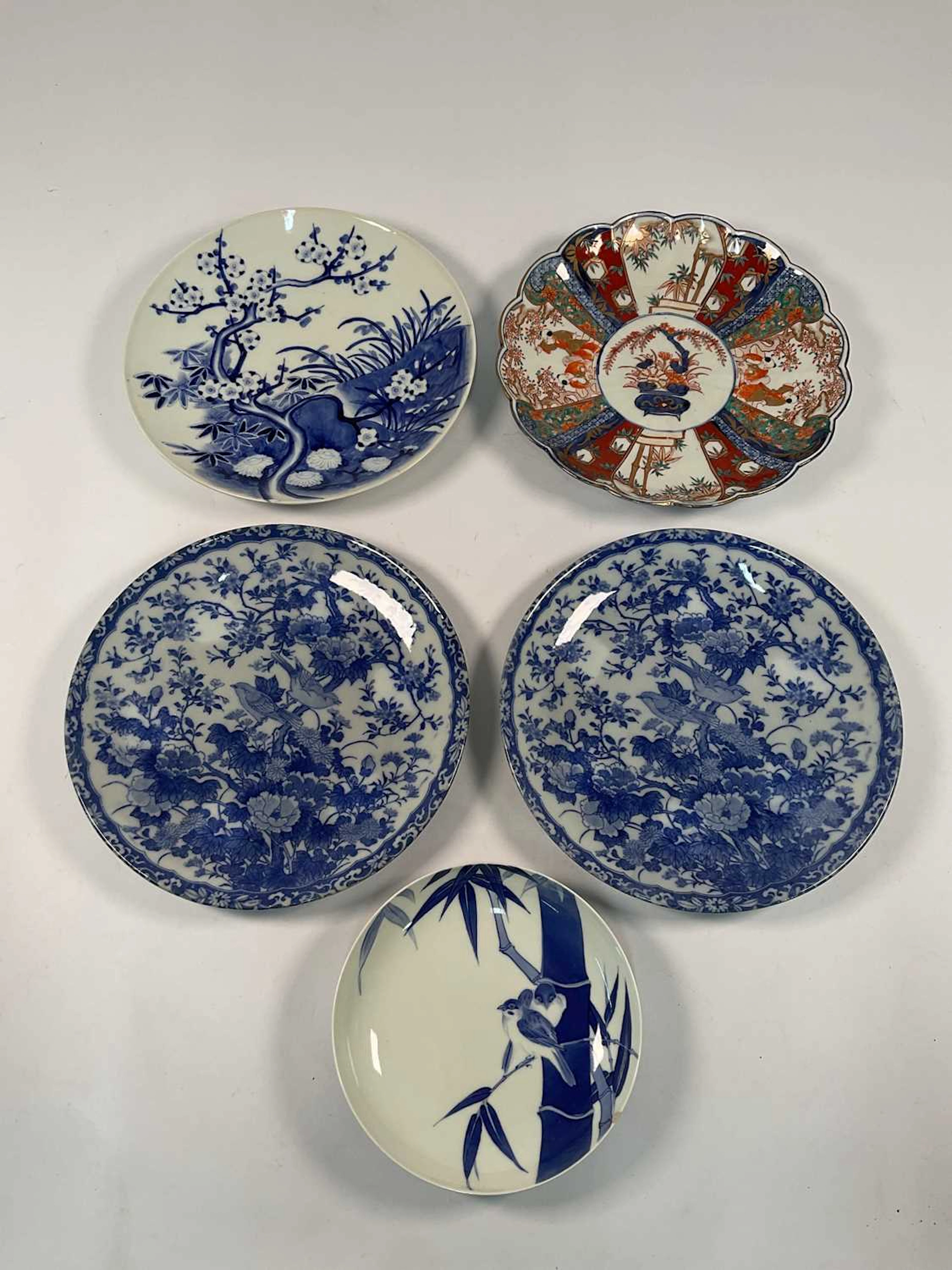 A pair of Japanese blue and white ceramic chargers...