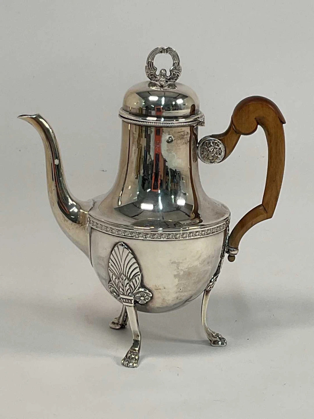 A late 19th century French Empire silver coffee pot with...