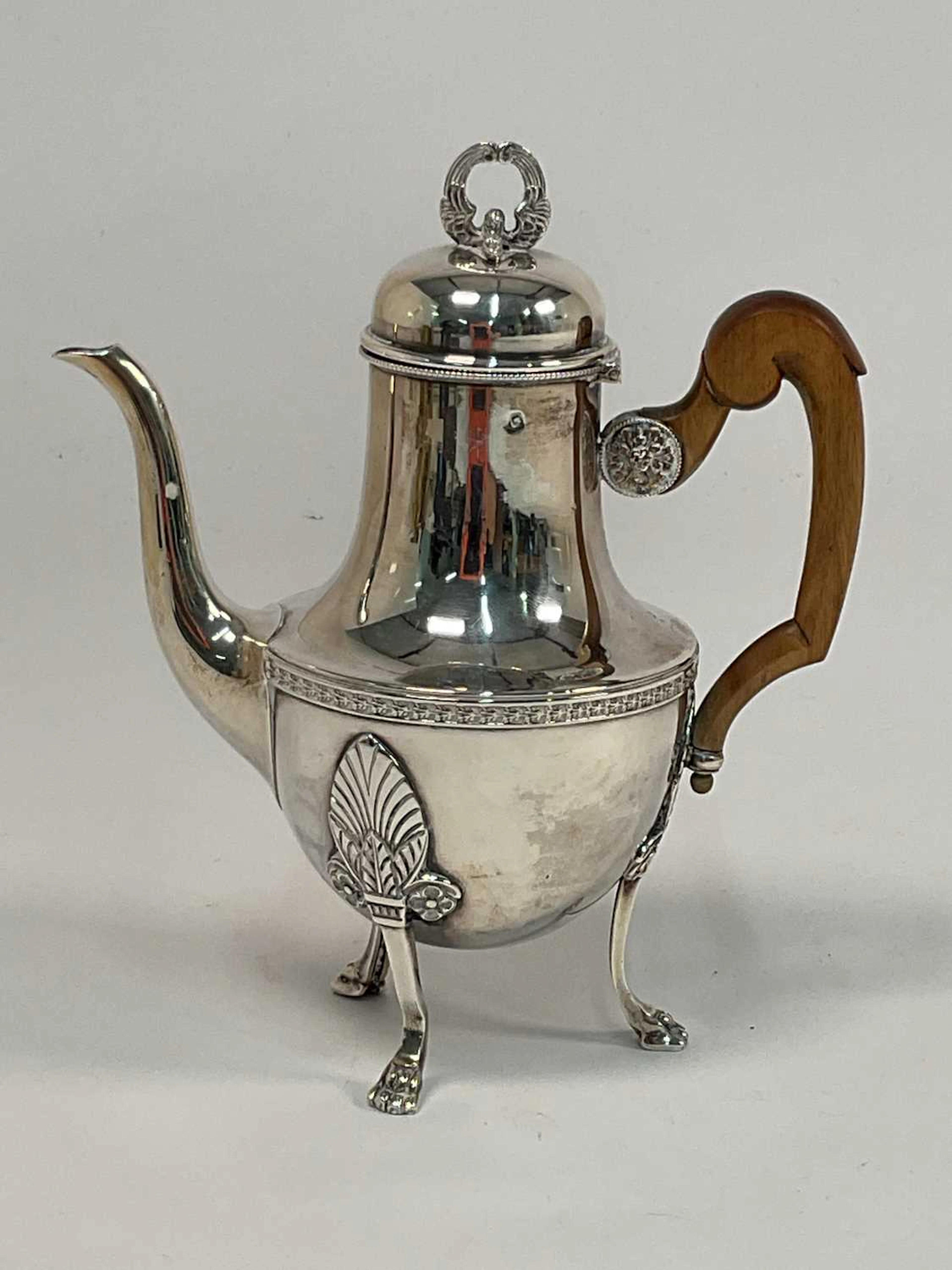A late 19th century French Empire silver coffee pot with...