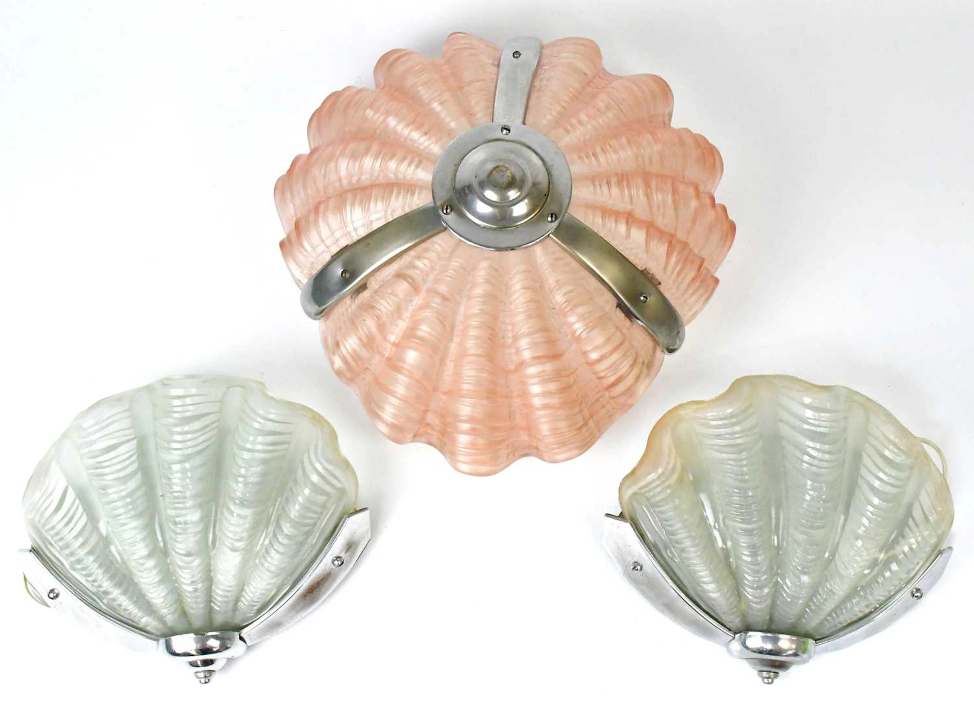 An Art Deco pink glass ceiling lampshade/plafonnier with...