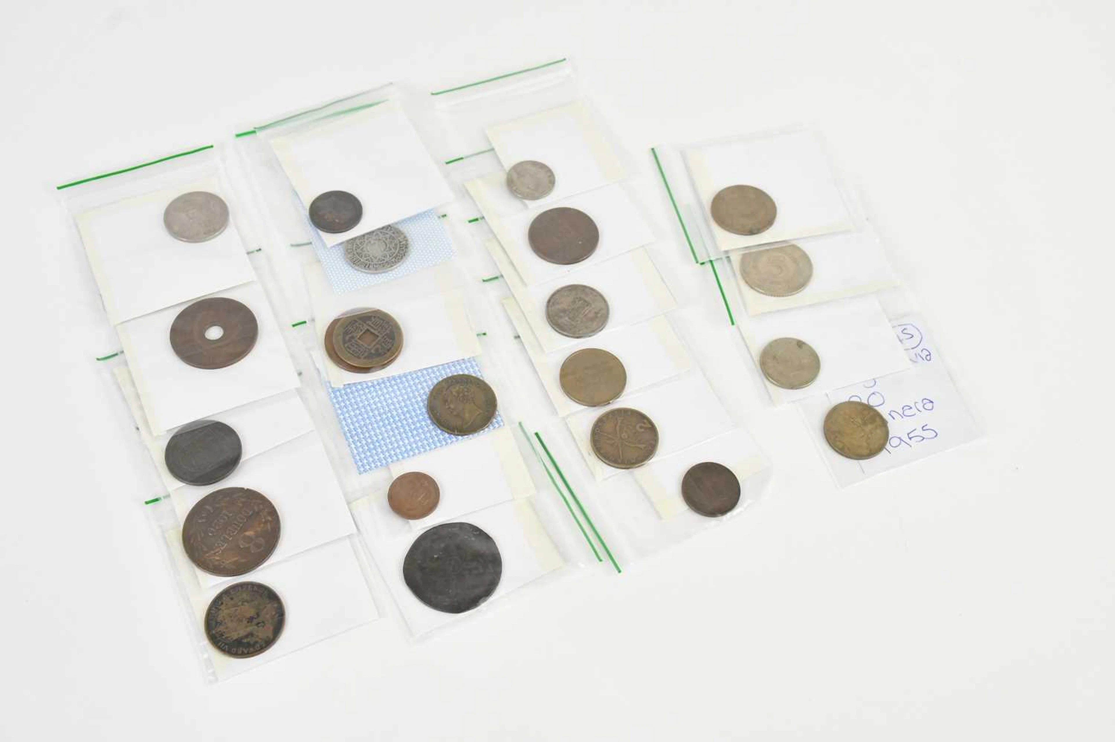 A collection of mixed foreign coins including Jersey