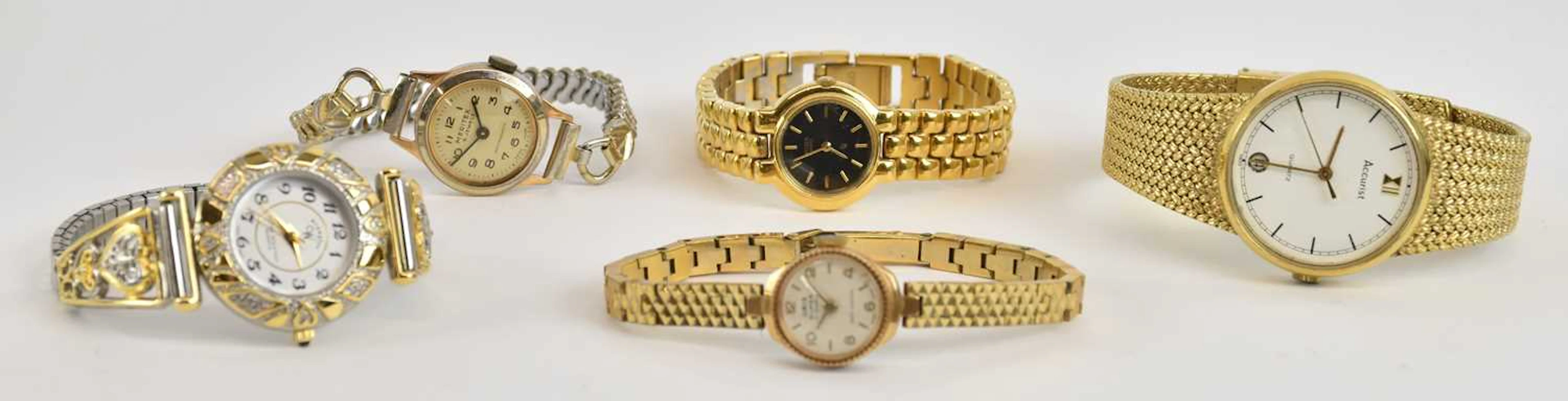 Five lady's gold tone dress watches including Accurist