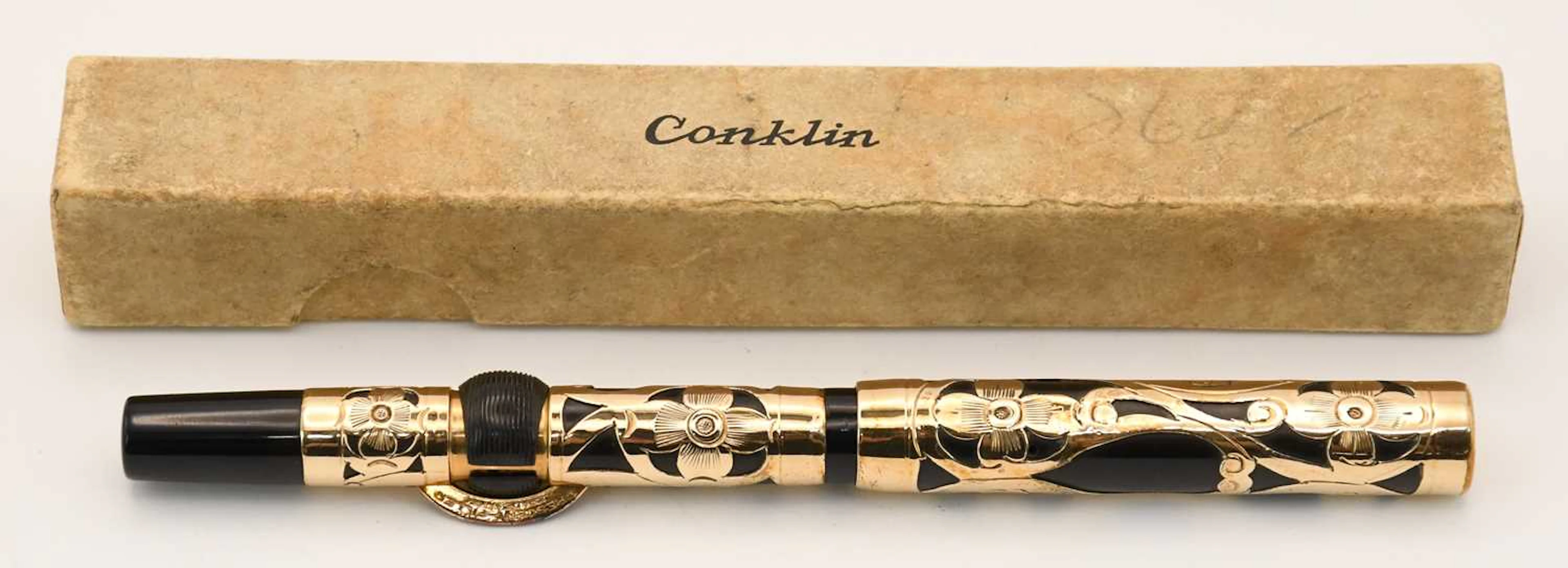 CONKLIN; an early 20th century Art Nouveau floral gold...