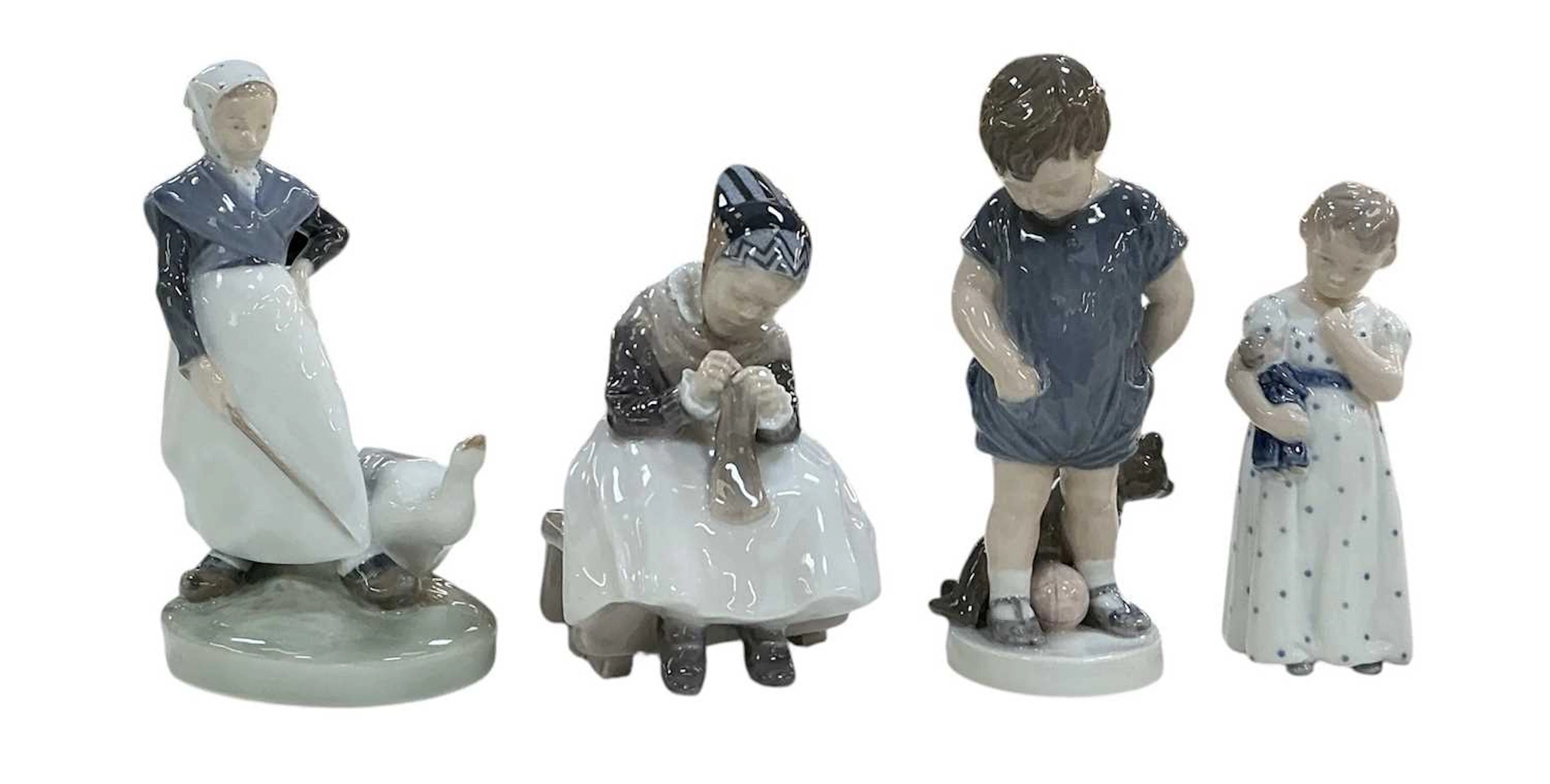 ROYAL COPENHAGEN; three assorted porcelain figures