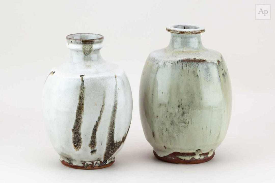 JIM MALONE (born 1946); a stoneware bottle covered in nuka glaze over iron slip