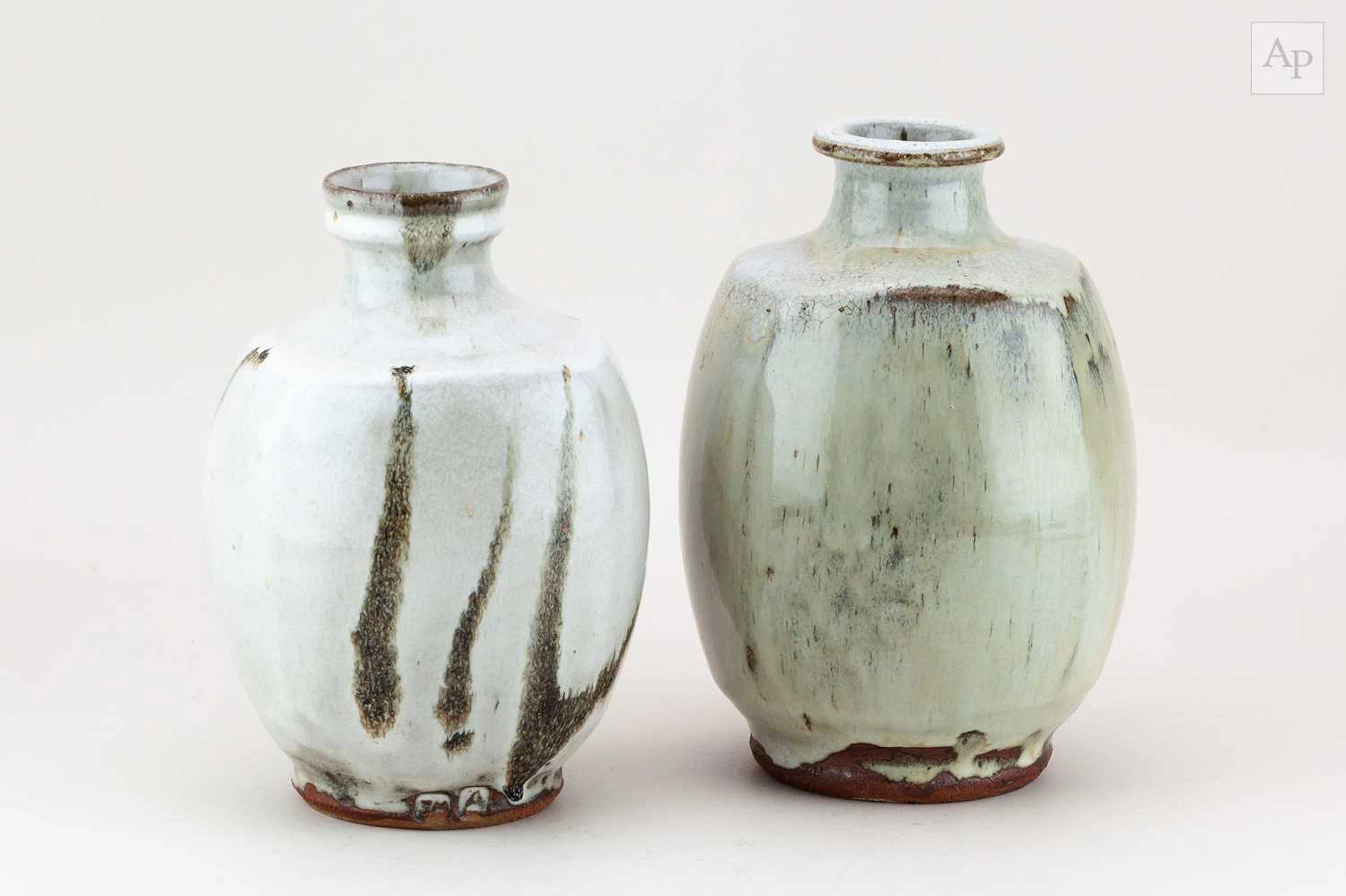 JIM MALONE (born 1946); a stoneware bottle covered in nuka glaze over iron slip