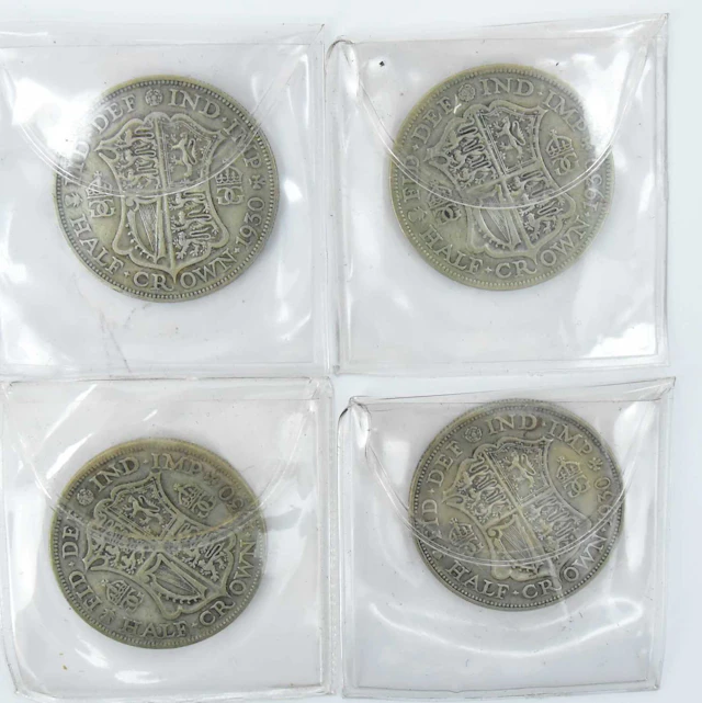 Four George V 1930 half crowns (4)