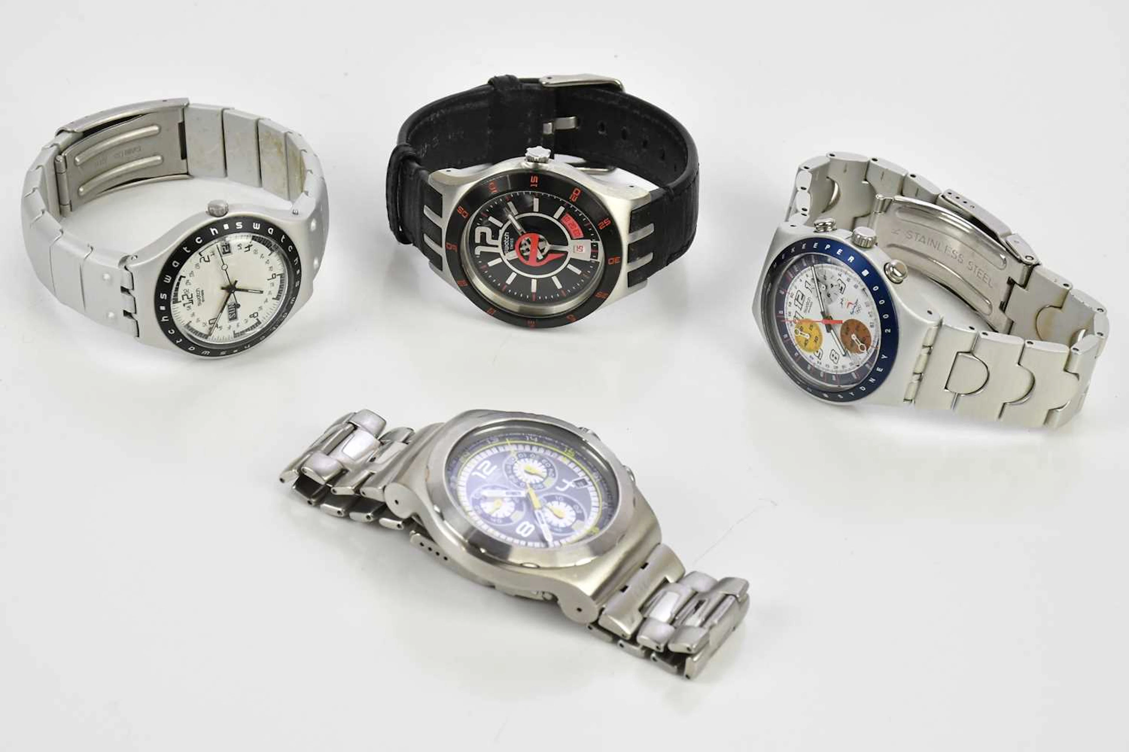 SWATCH; a collection of four watches