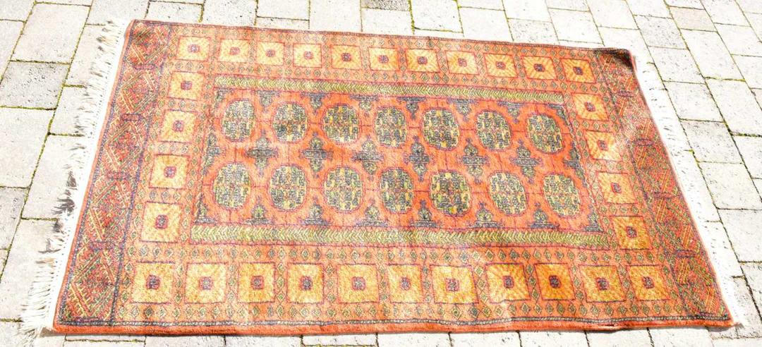 A Turkish style rug with tribal of Bokhara style...