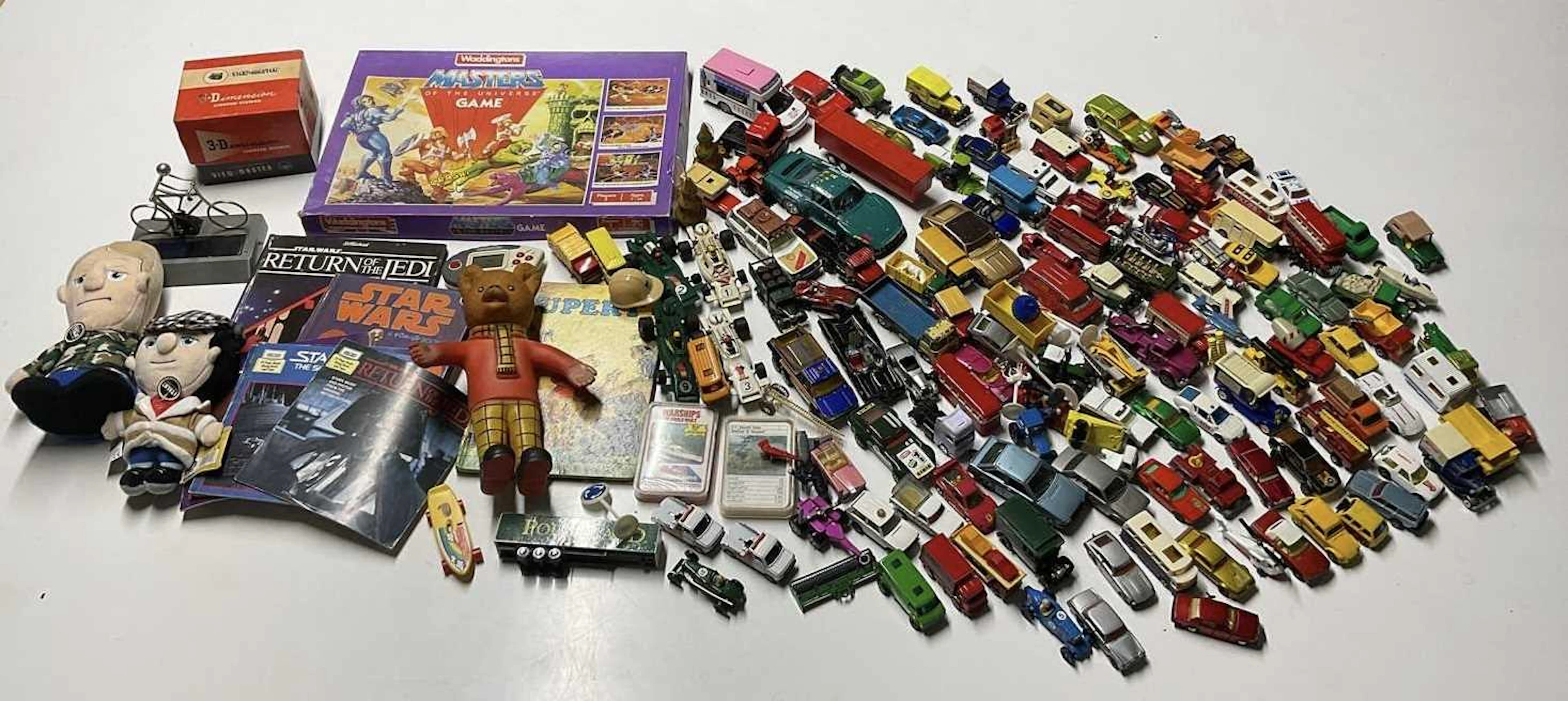 A quantity of vintage and modern toys