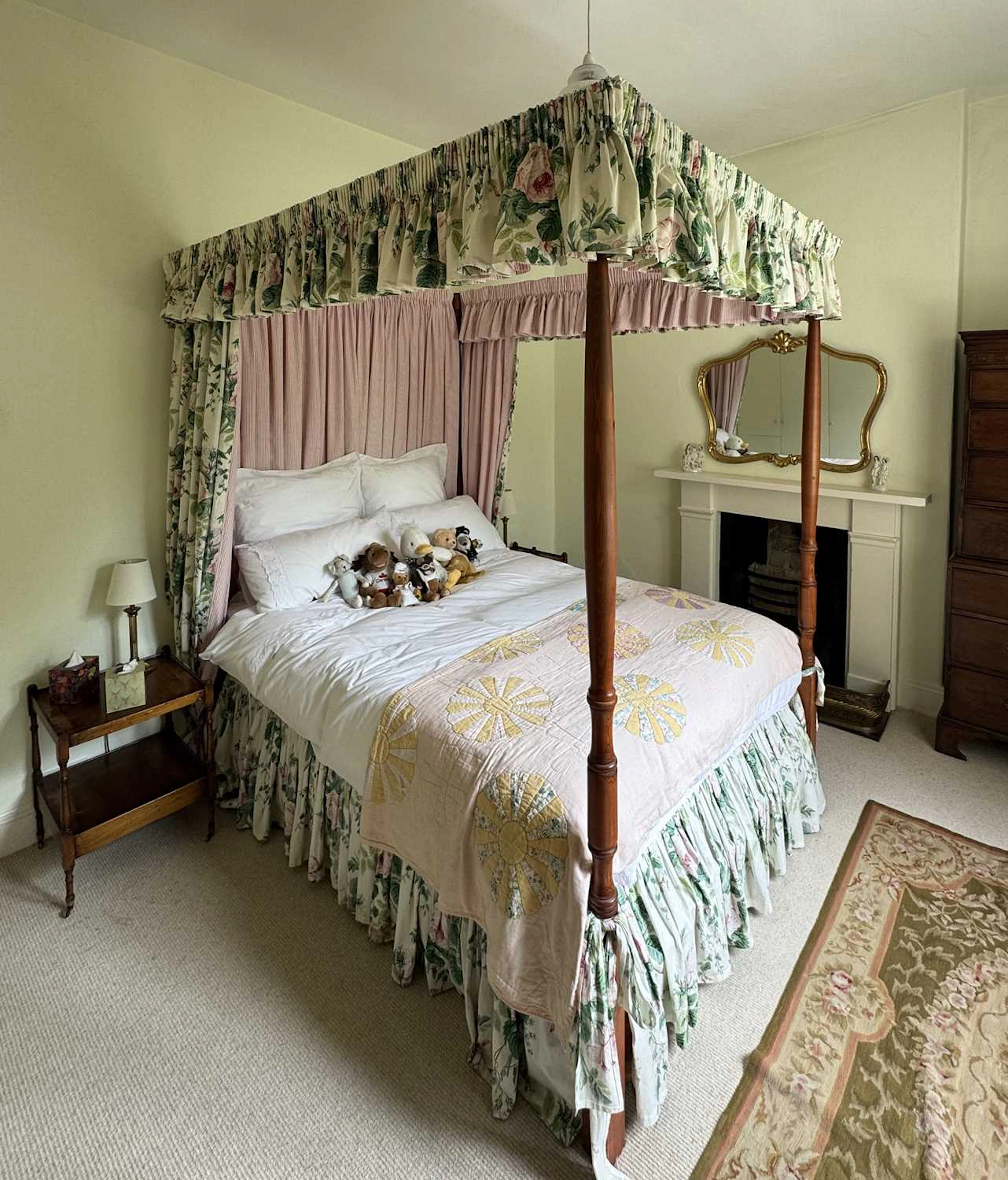 A modern pine four poster bed