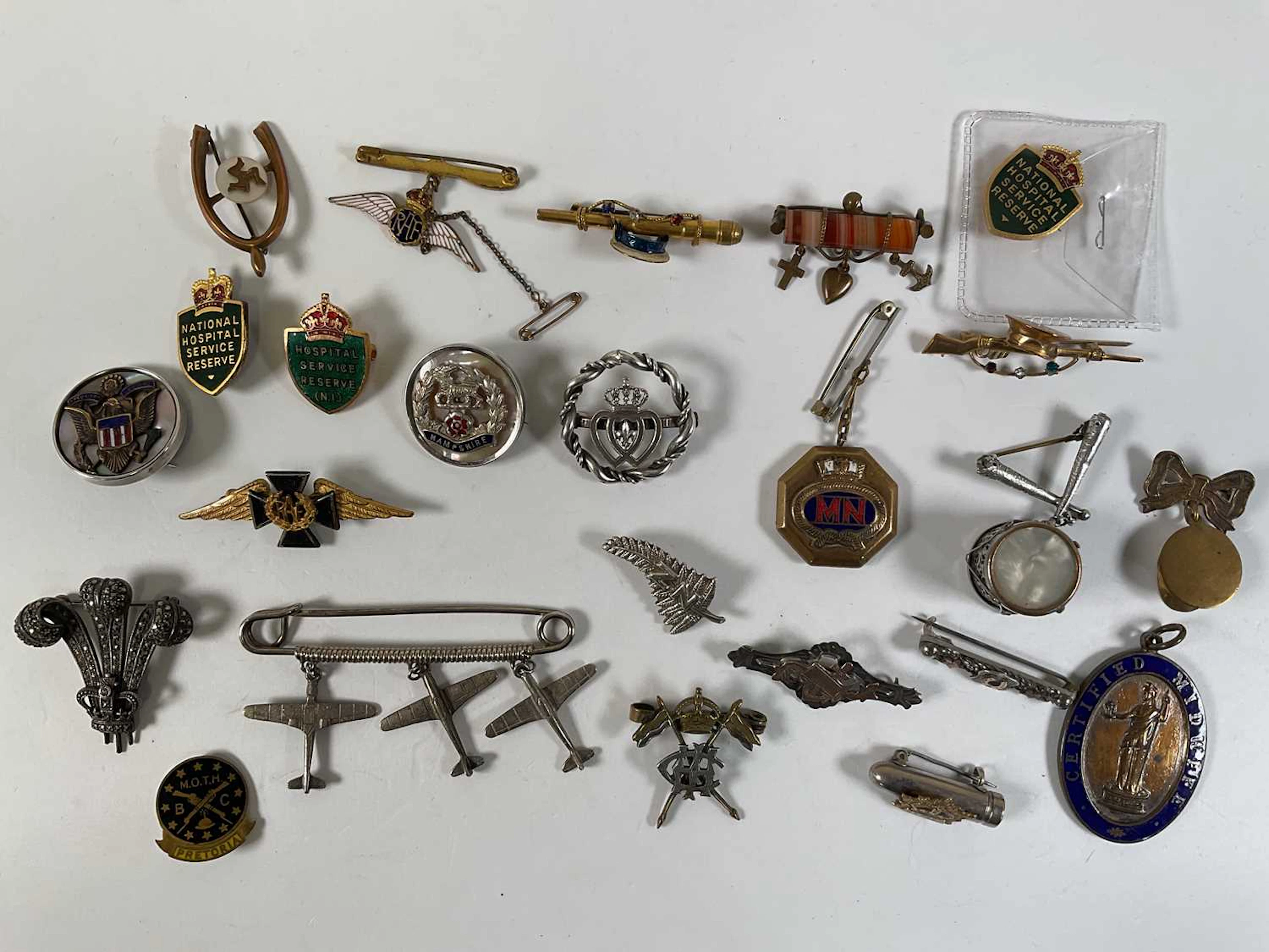 SWEETHEART BADGES; twenty-three mixed army related...