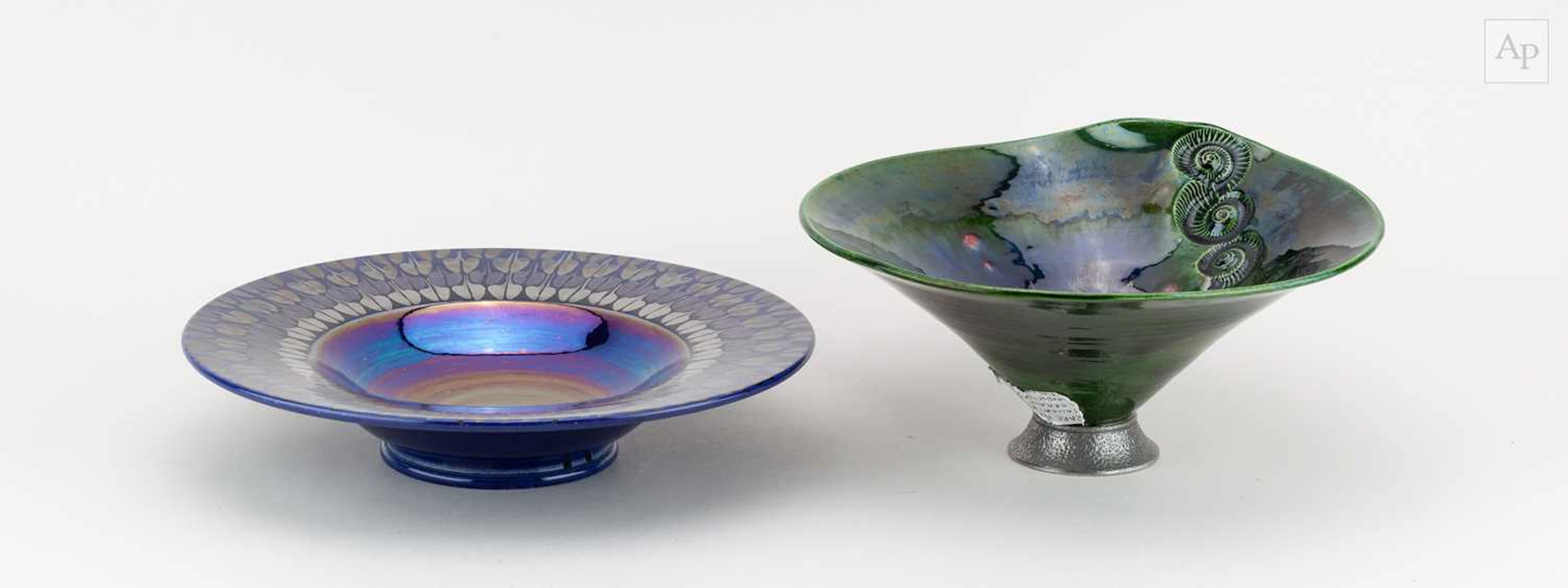 LORRAINE BATES; a conical stoneware bowl on a pewter foot...