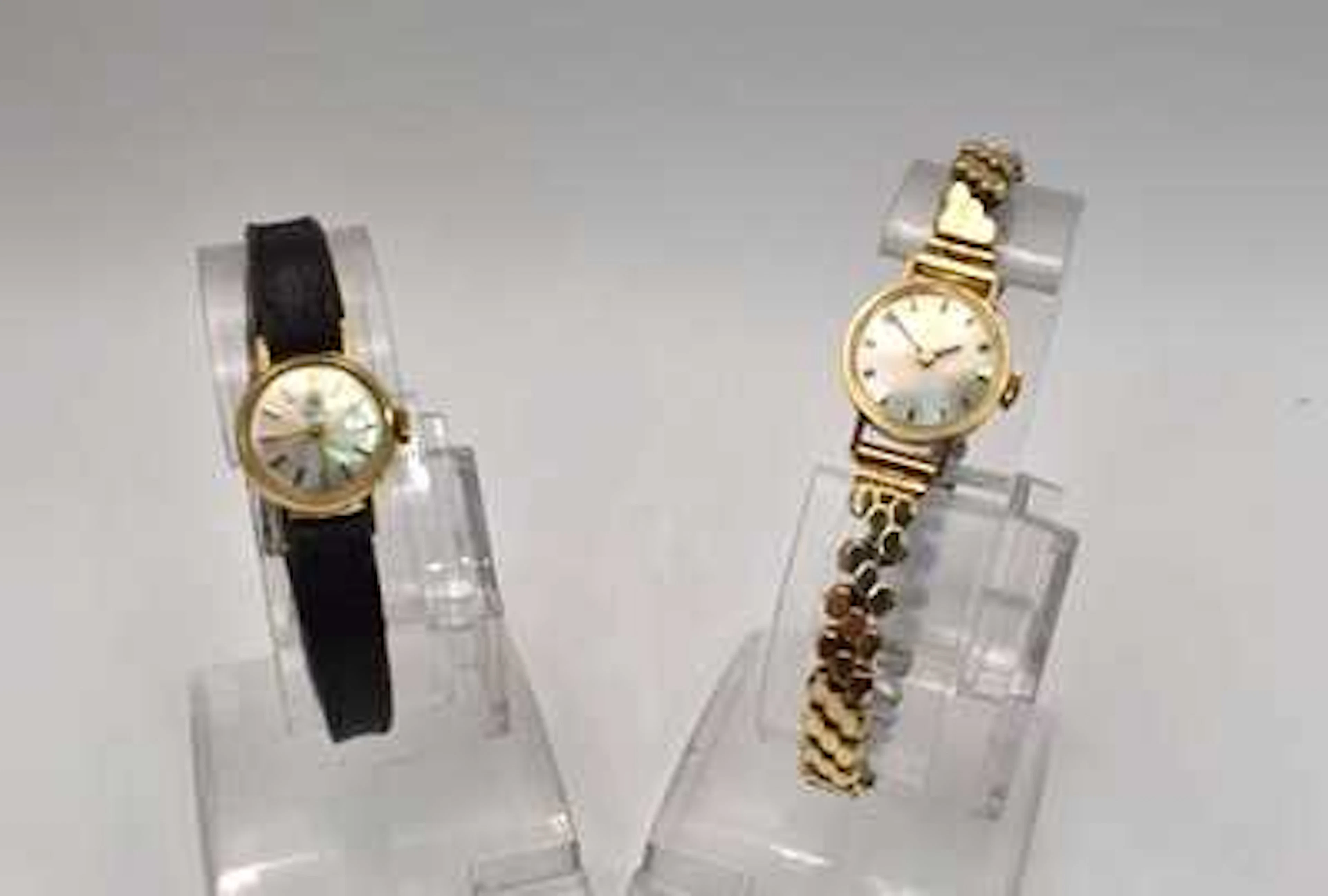 TISSOT; two vintage manual wind gold plated lady's wristwatches
