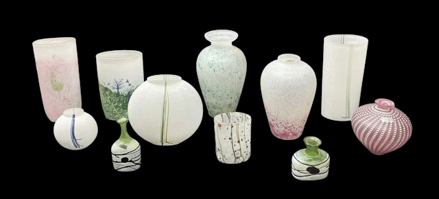 KOSTA BODA; eleven pieces of studio art glass including vases