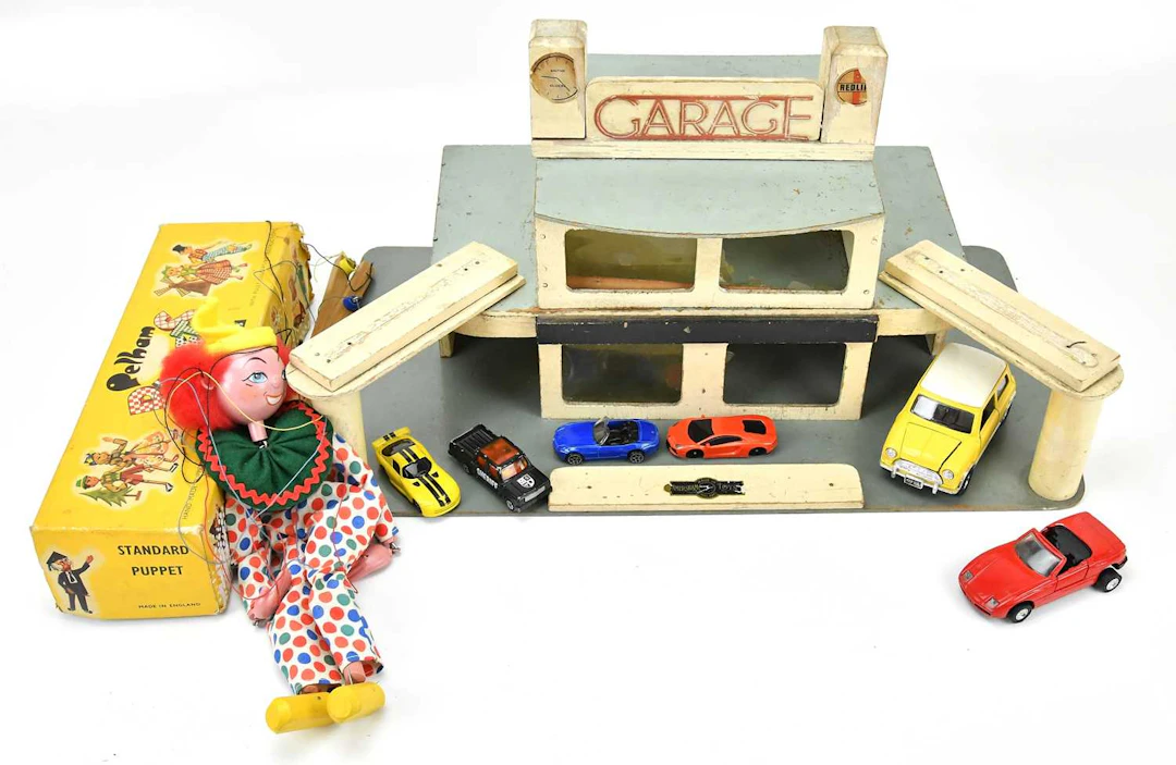 A vintage wooden model of a garage