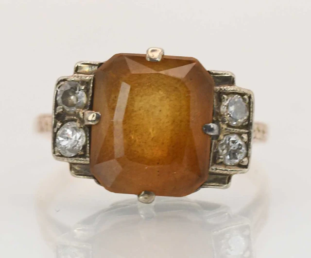 A yellow metal smoky quartz and diamond set Art Deco style cluster ring