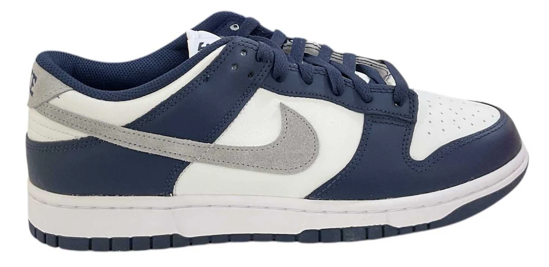 NIKE; a pair of Nike Dunk Low midnight navy/Lt smoke grey trainers