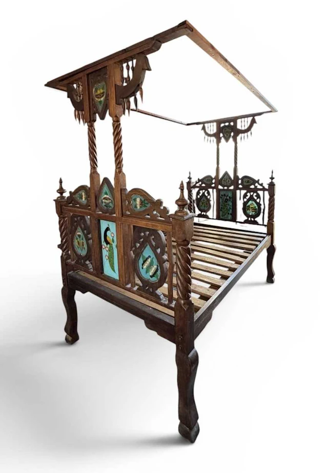 An Indian carved hardwood 'Lamu' bed