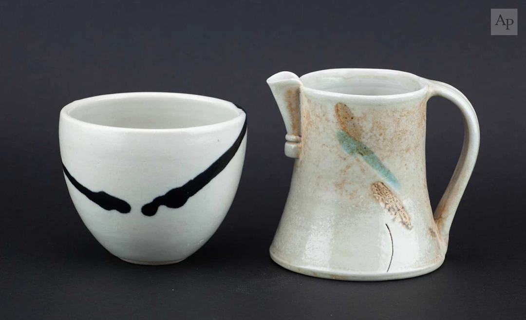 JACK DOHERTY (born 1948); a small porcelain jug covered in soda vapour glaze