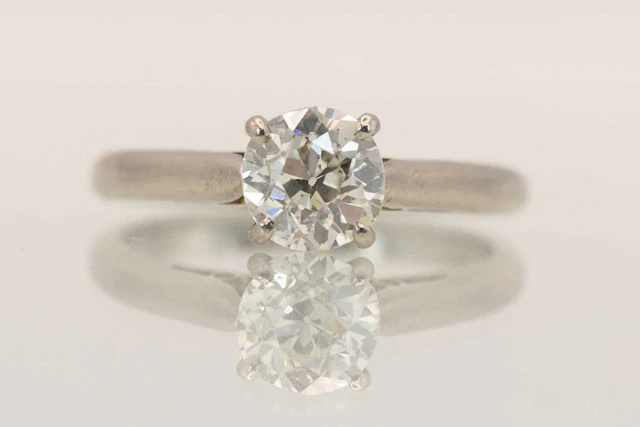 A white metal diamond solitaire ring