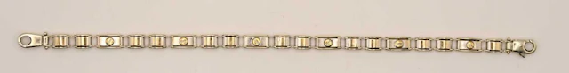 A 9ct white gold buckle type bracelet