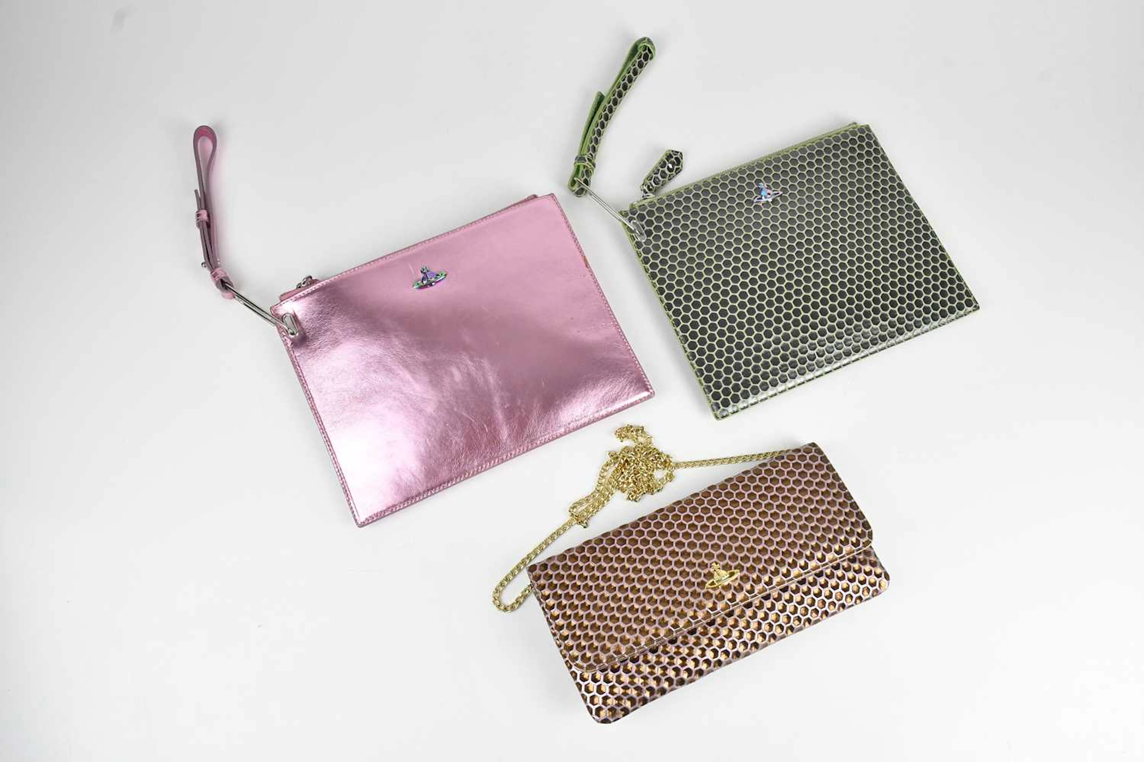 Vivienne Westwood ; a bronze and pink honeycombe clutch...