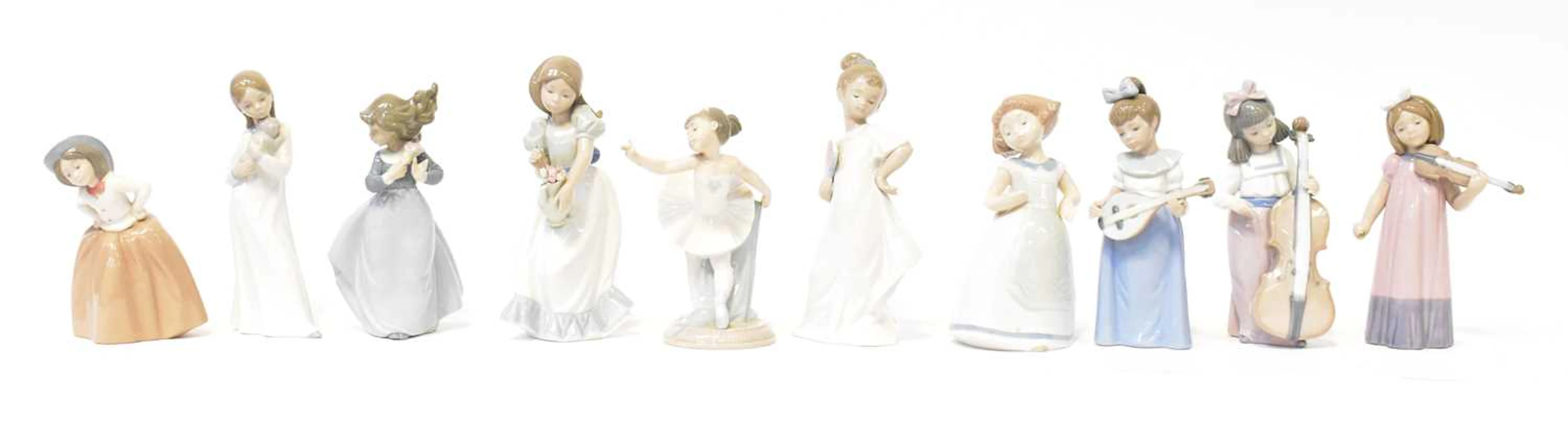 NAO; ten porcelain figures of young girls